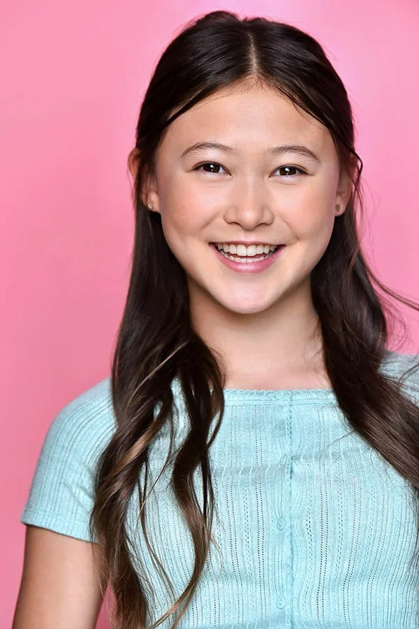Casting-ready children’s actor headshot in Los Angeles featuring a natural, joyful expression and clean studio lighting. Photographed by Marc Cartwright Headshots for film, television, and commercial auditions.