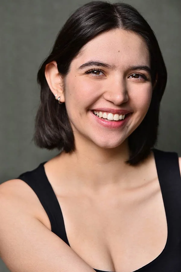Professional female actor headshot in Los Angeles by Marc Cartwright featuring authentic commercial smile