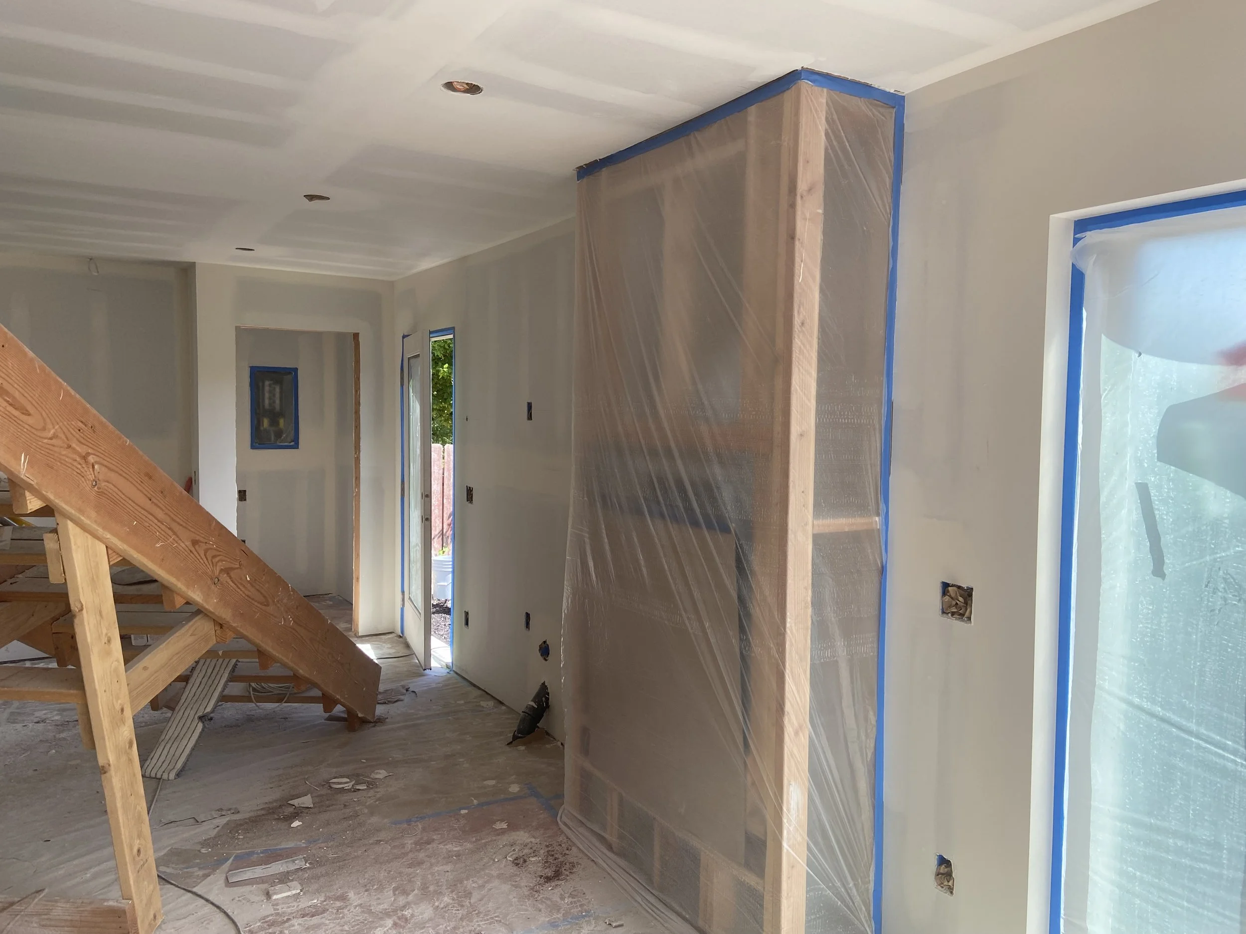 Masking and surface protection before primer application in Snohomish and King County, WA — L.A. Drywall Inc.