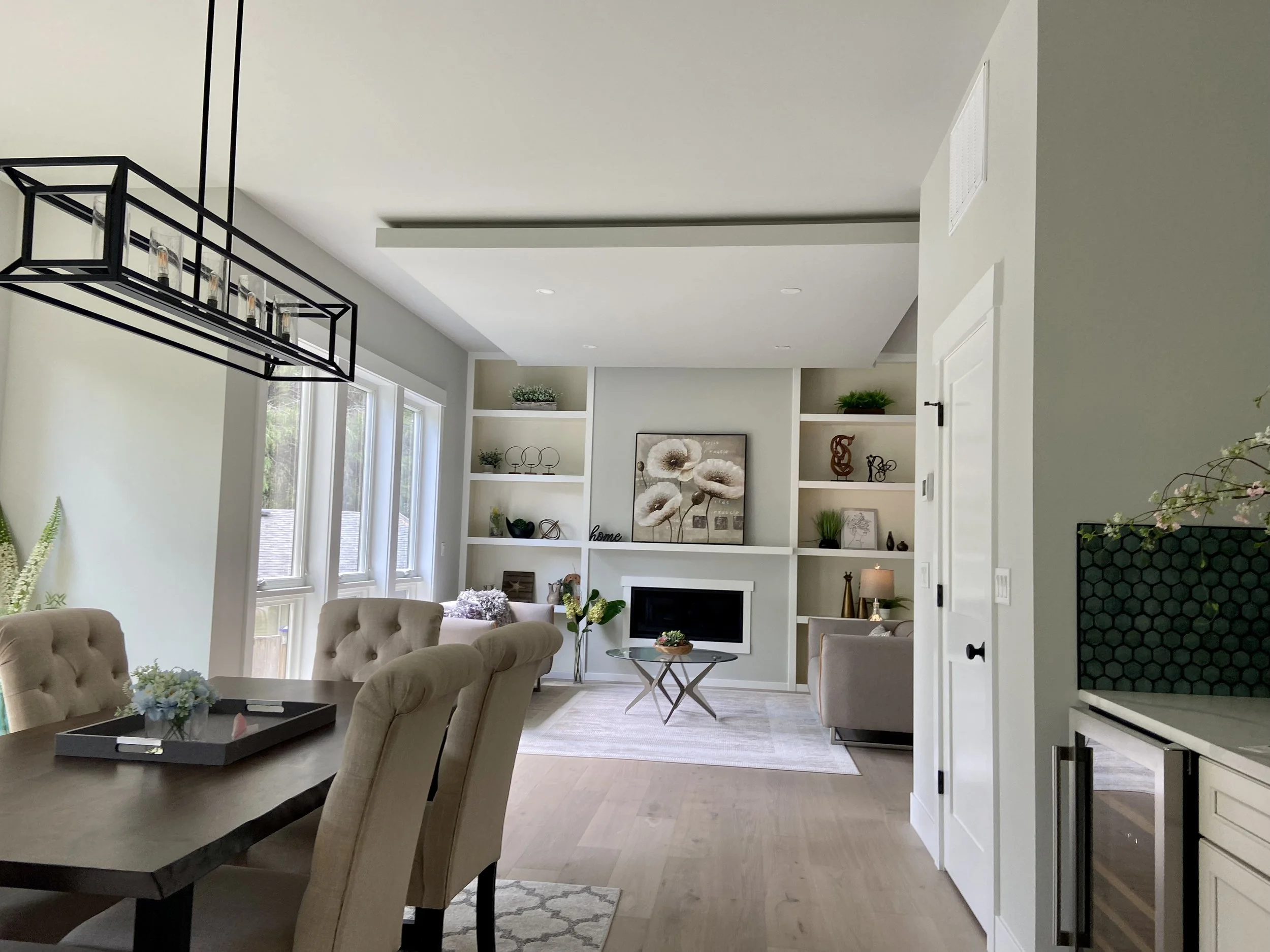 Living room drywall installation with skim coating, primer, and finished paint in Bellevue, WA