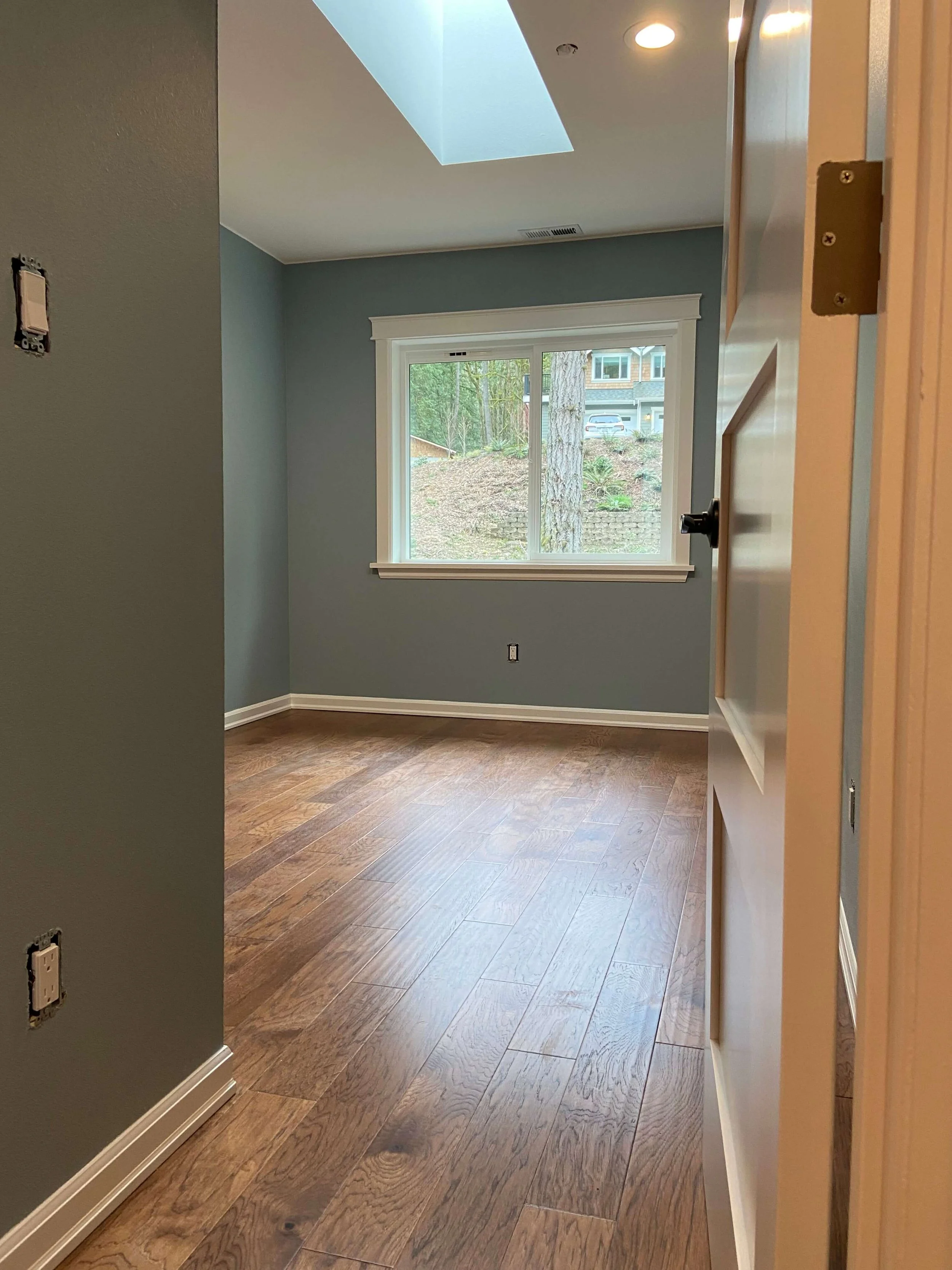 New construction home in Bothell featuring Level 4 and Level 5 drywall finishes with smooth paint-ready surfaces