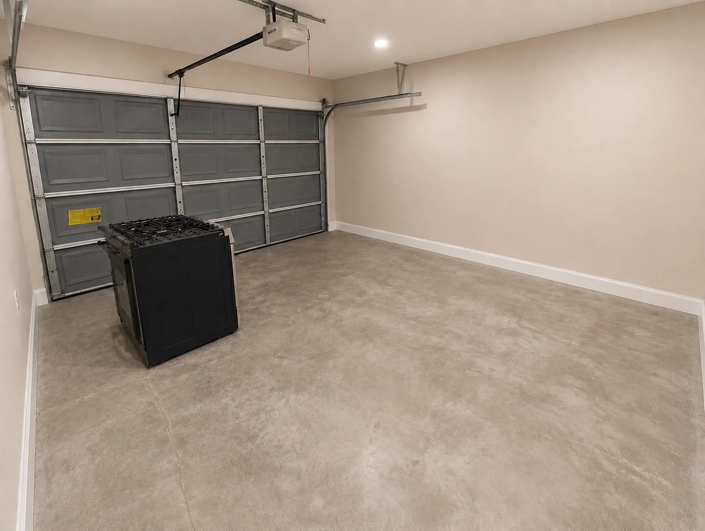 Finished Seattle garage with Level 4 drywall finish, primer, paint, and smooth walls
