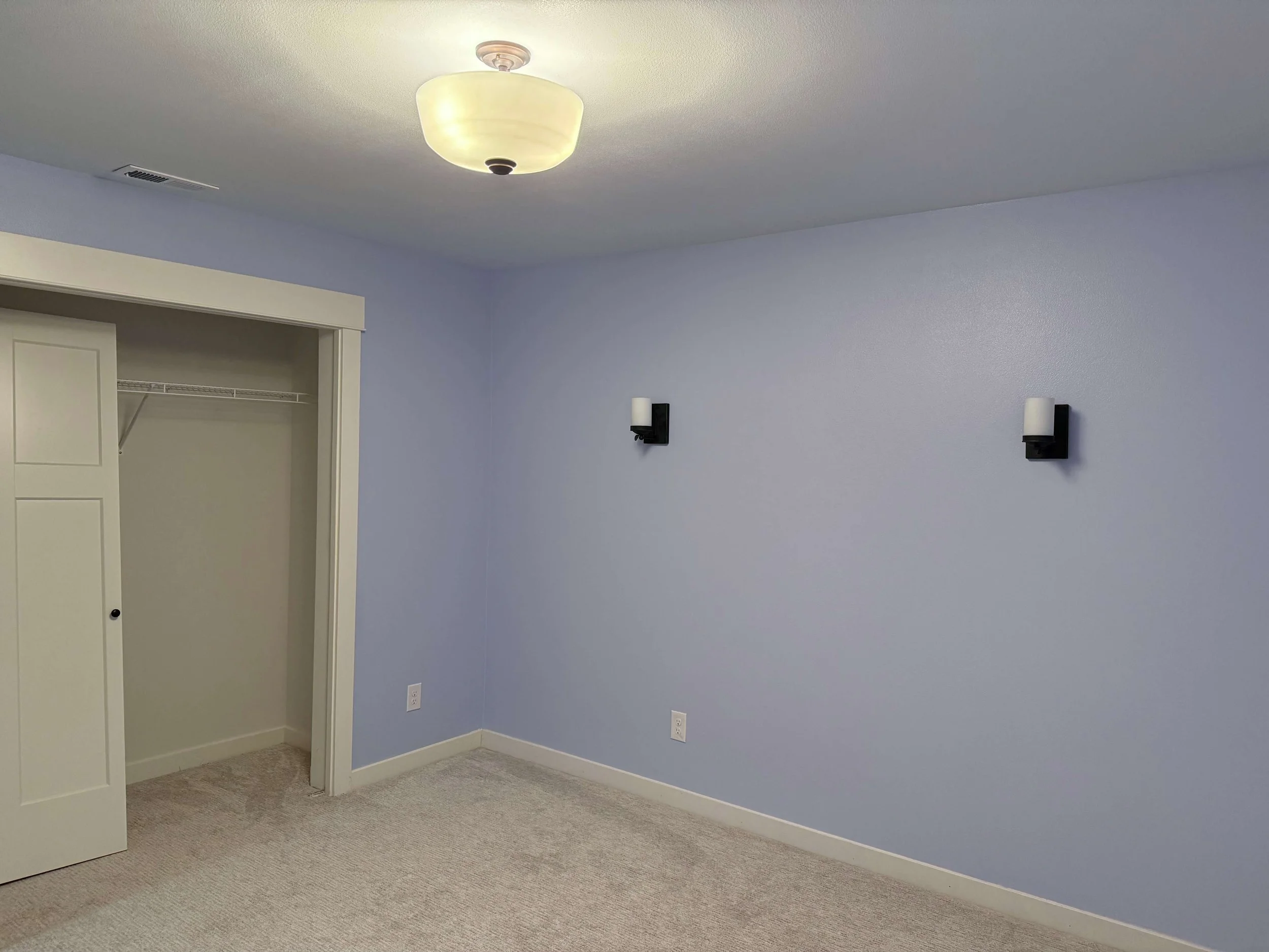 Completed drywall repair in Kirkland with seamless wall restoration, smooth finish, and professionally painted interior.