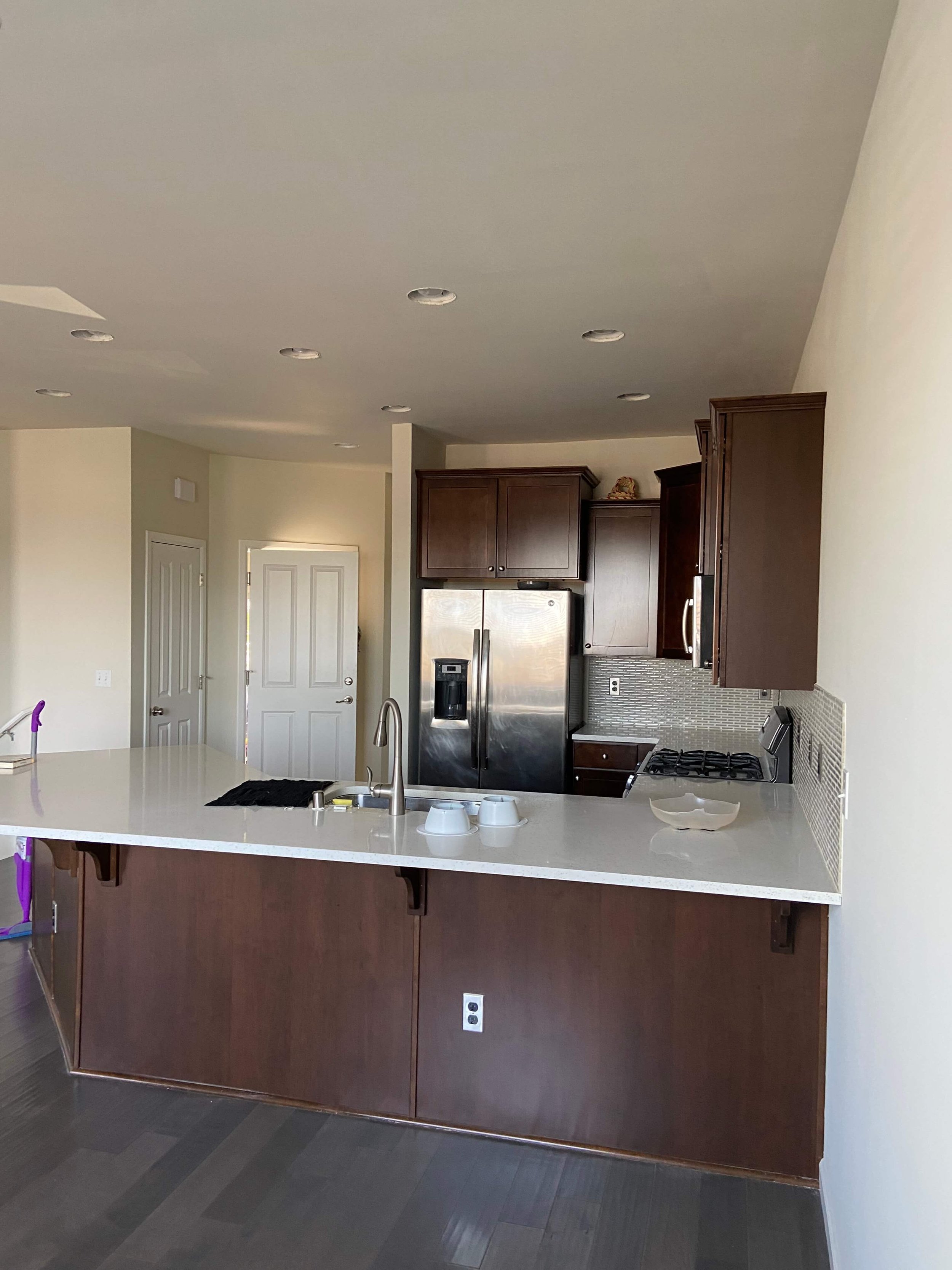 After water damage restoration in Lynnwood WA with new ceiling drywall installation, Level 4 smooth finish, and professional interior painting.