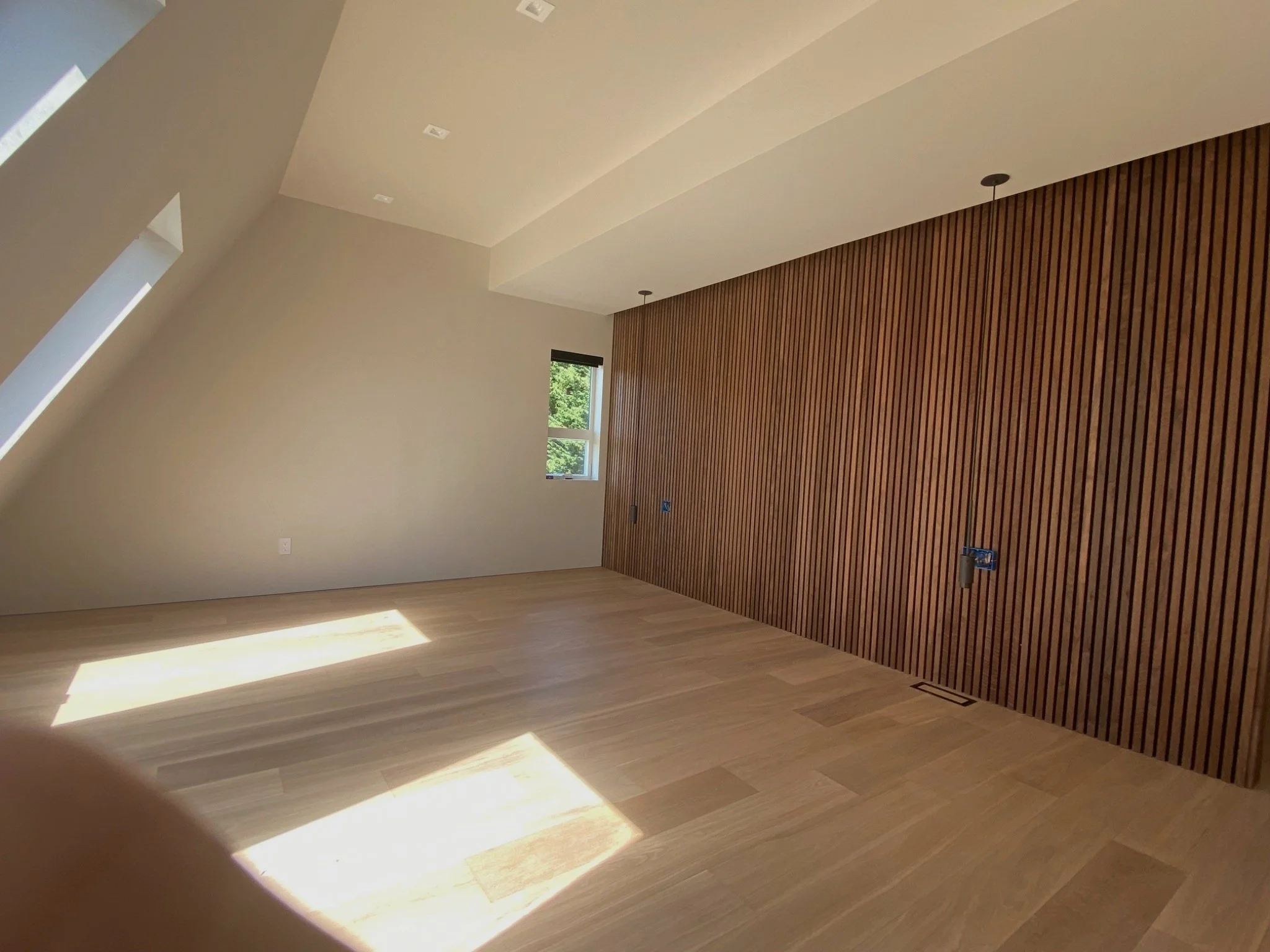 Architectural drywall with shadow reveals, recessed baseboards, and flush door detailing – Redmond WA