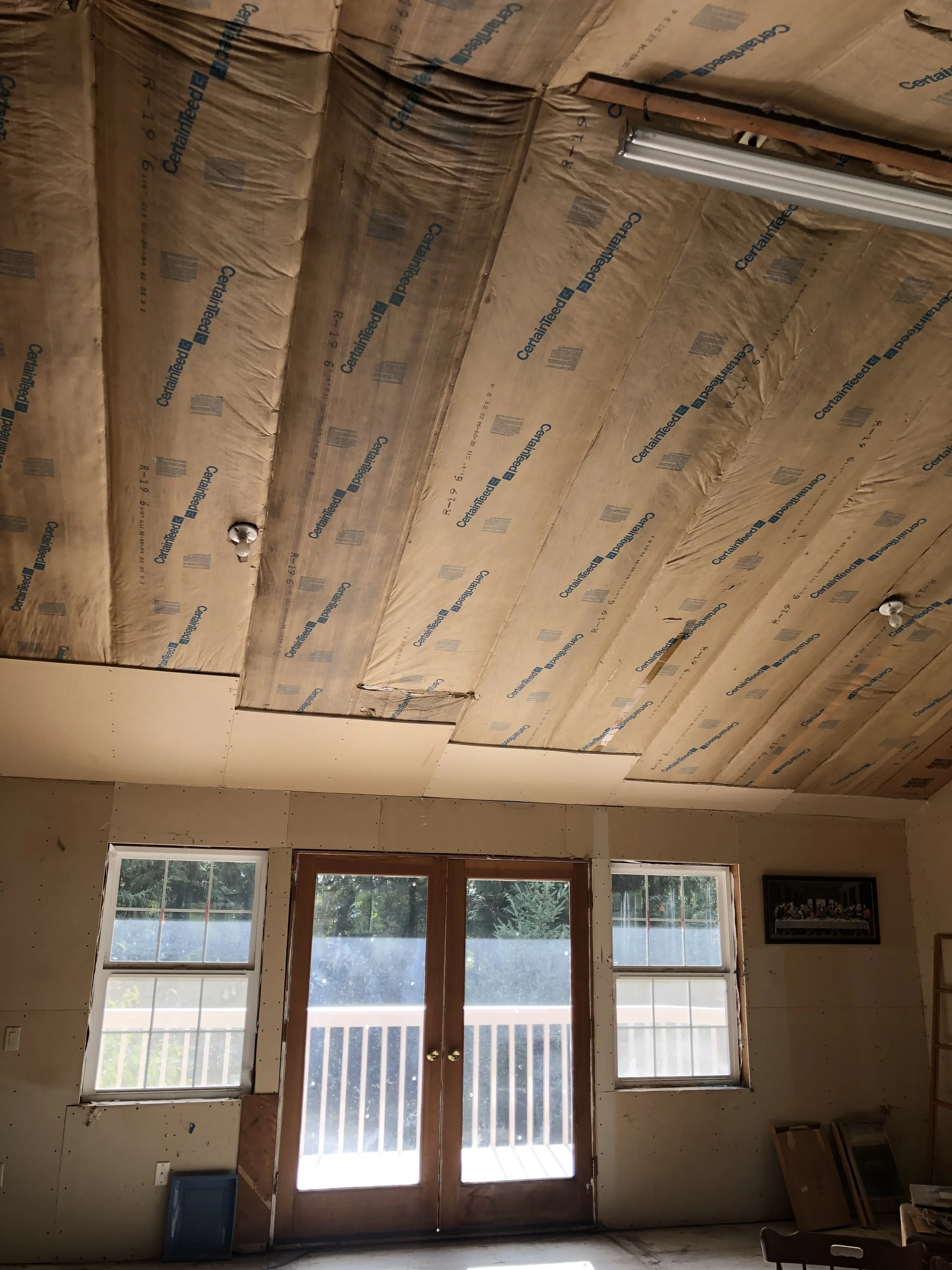 Before drywall installation inside a Kirkland ADU showing unfinished walls and ceiling before Level 4 drywall finishing.
