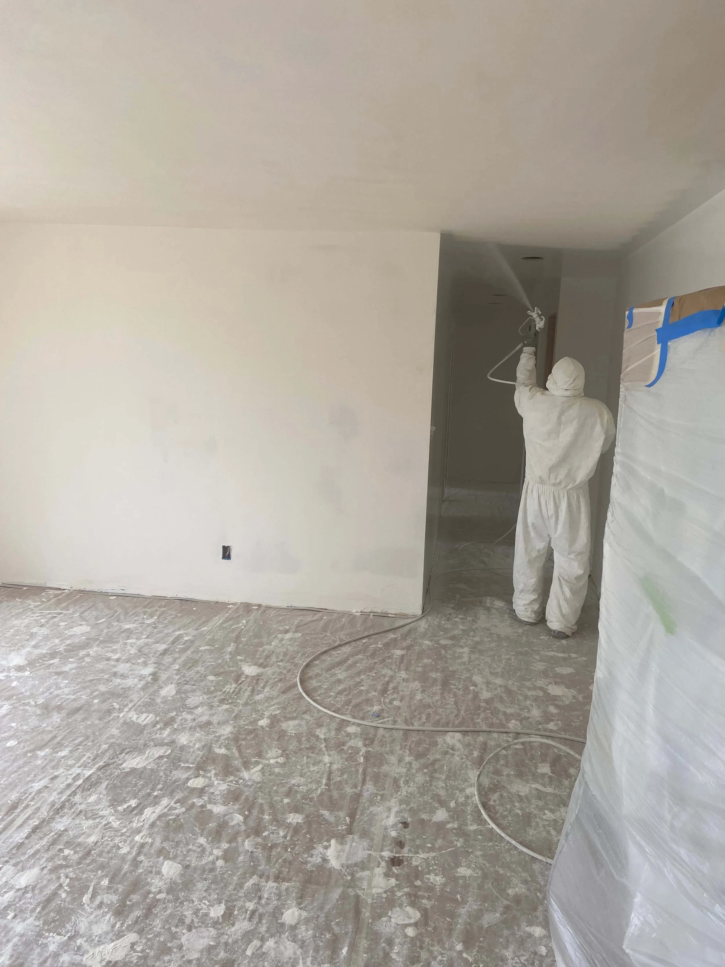 Drywall PVA primer application and finish touch-ups for a Level 5 wall finish in Redmond, WA