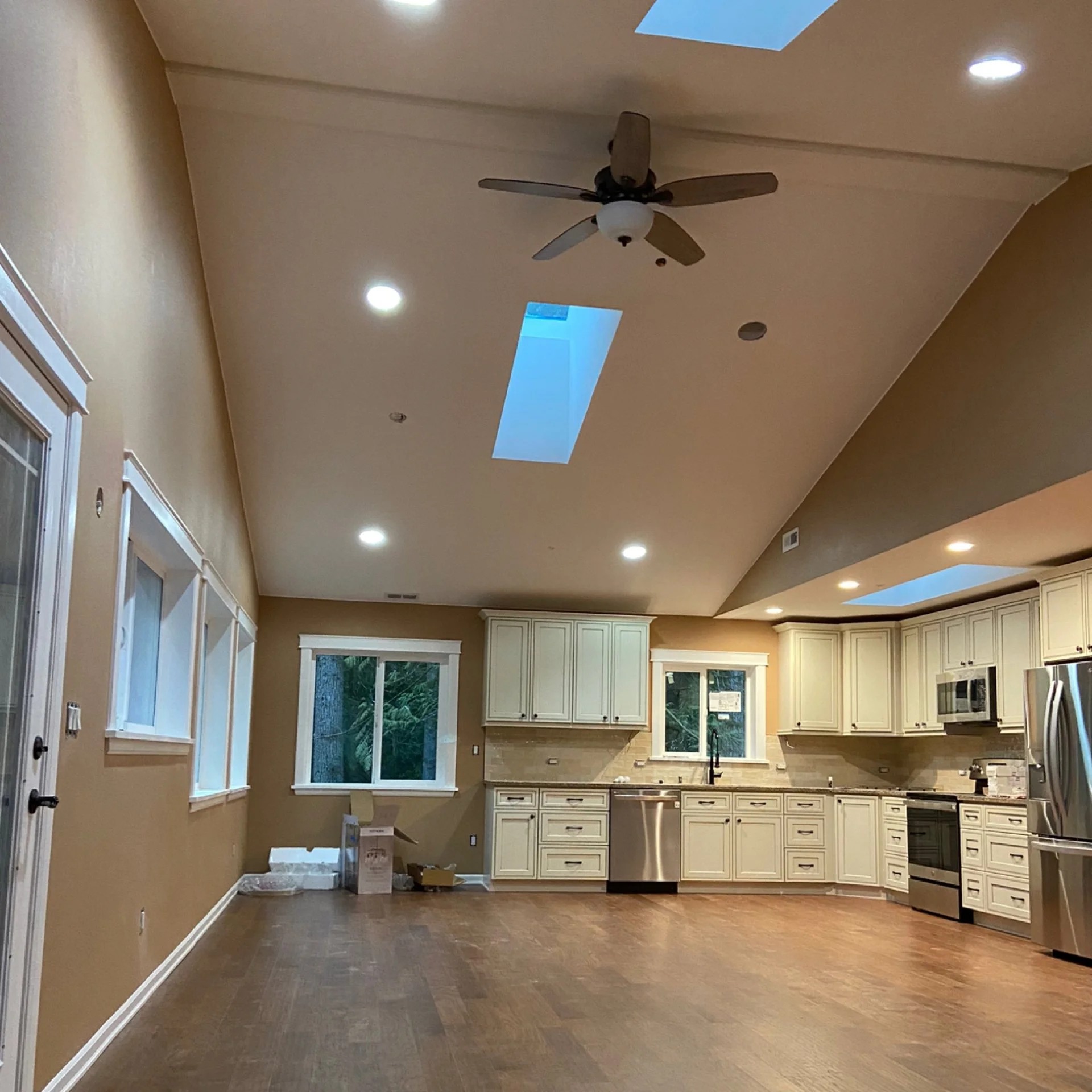 Kitchen drywall installation with skim-coated smooth walls, primer, and paint in Redmond, WA