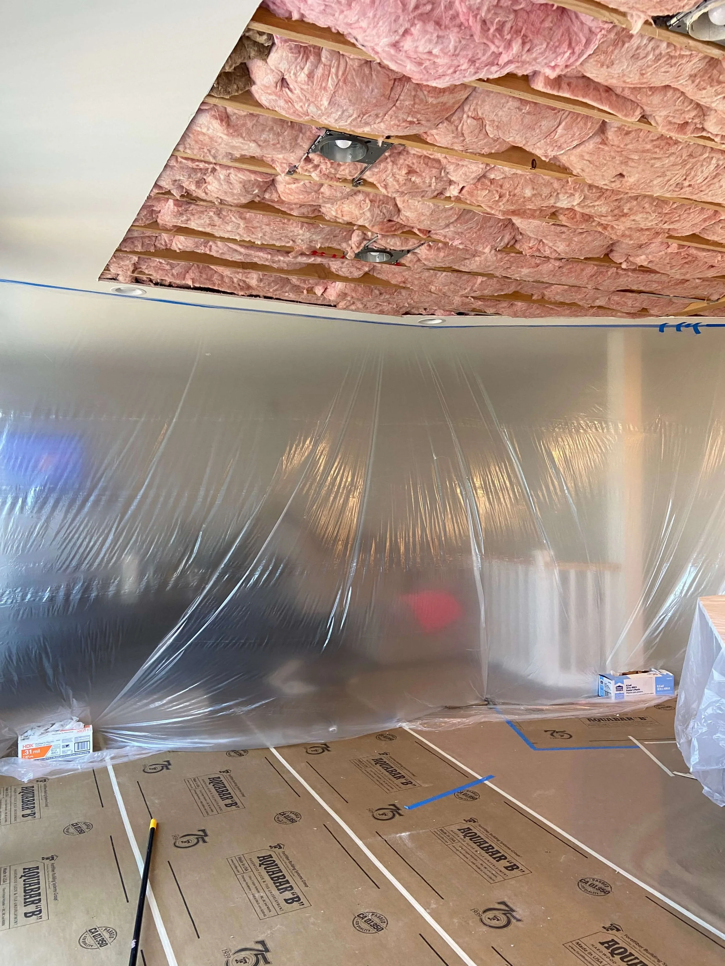 Dust containment barrier setup during drywall repair in Lynnwood WA to protect surrounding areas and maintain a clean workspace.