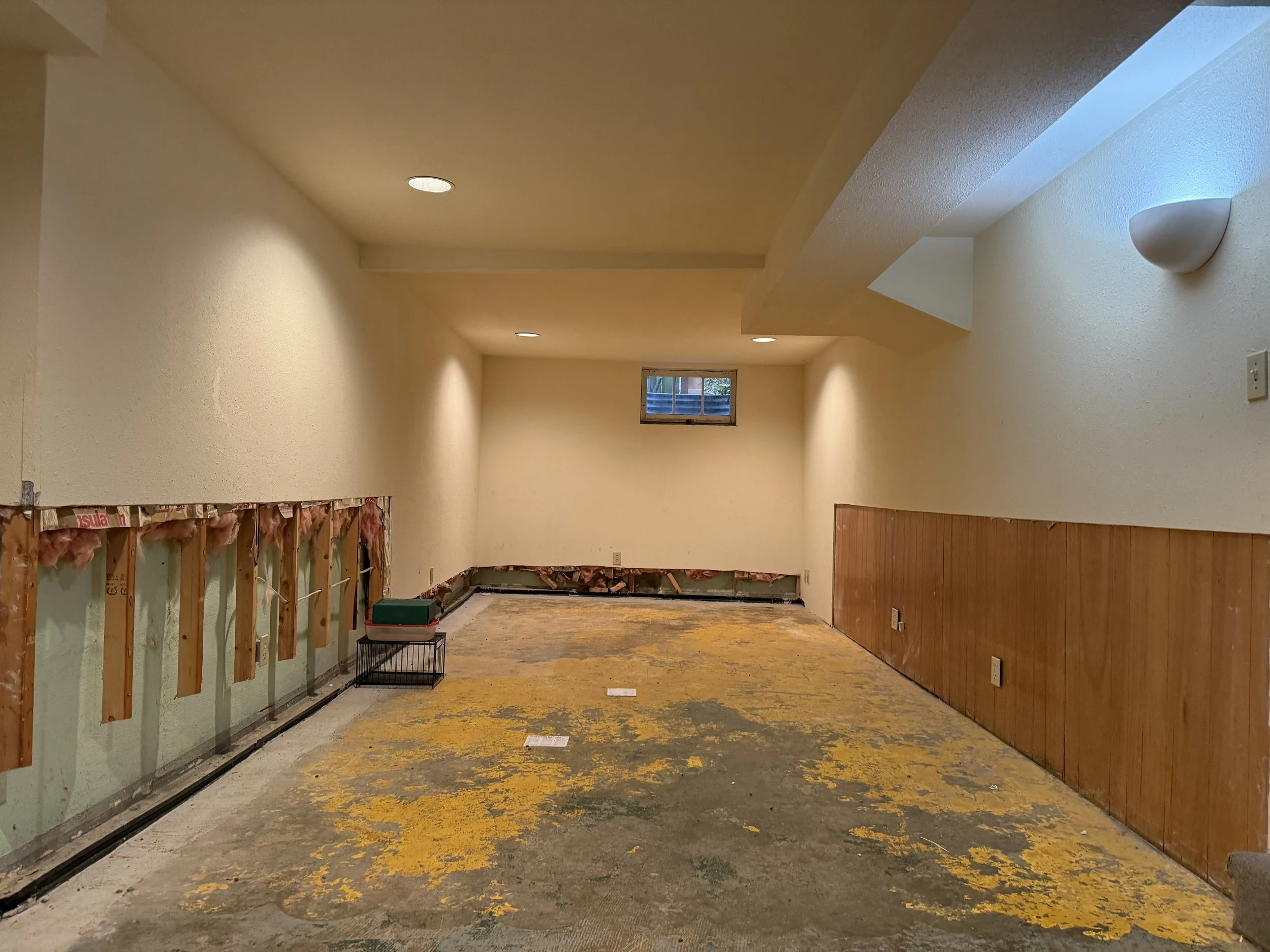 Basement before drywall finishing and skim coating in Queen Anne Seattle WA.