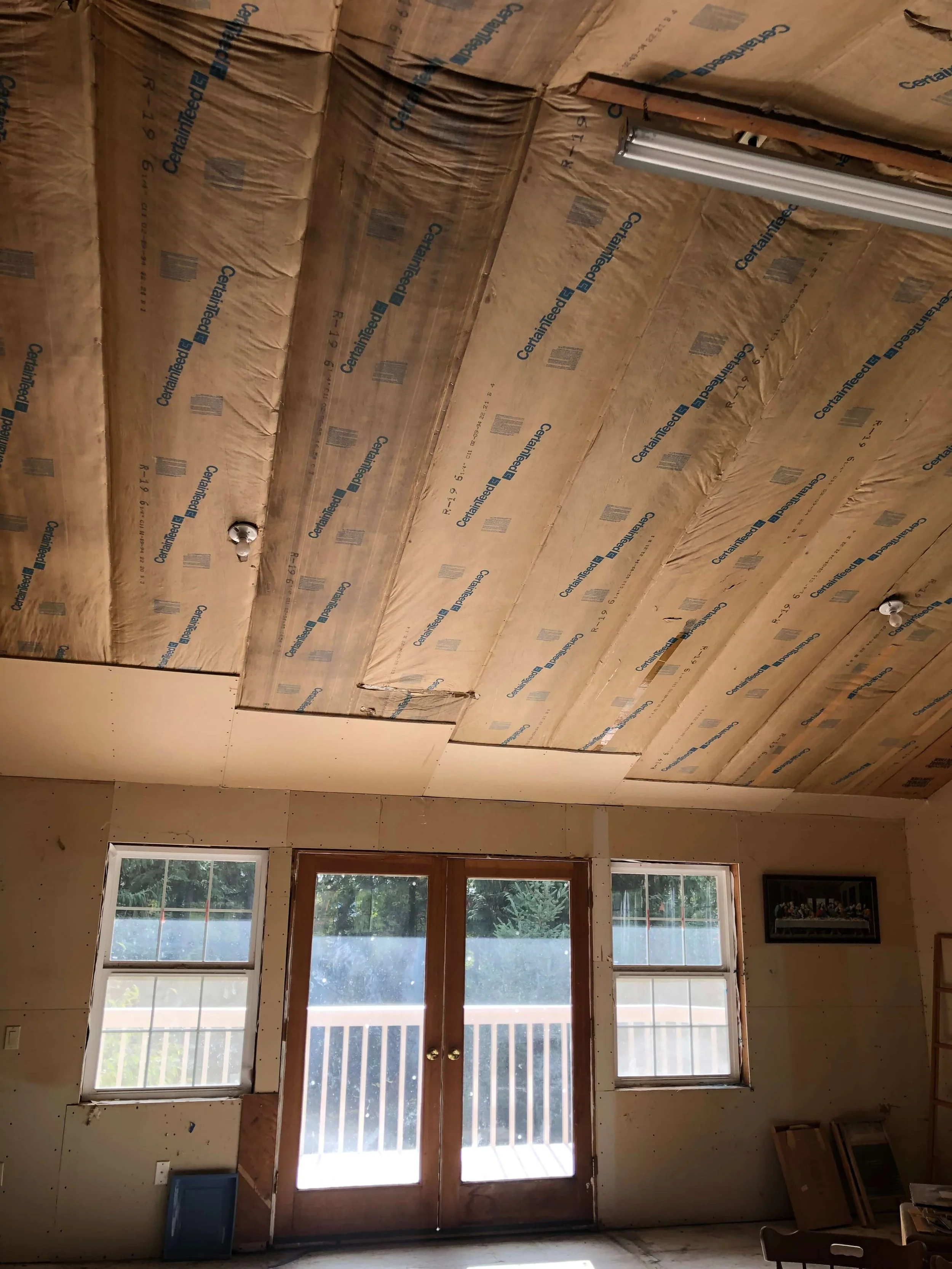 Before drywall installation inside a Kirkland ADU showing unfinished walls and ceiling before Level 4 drywall finishing.