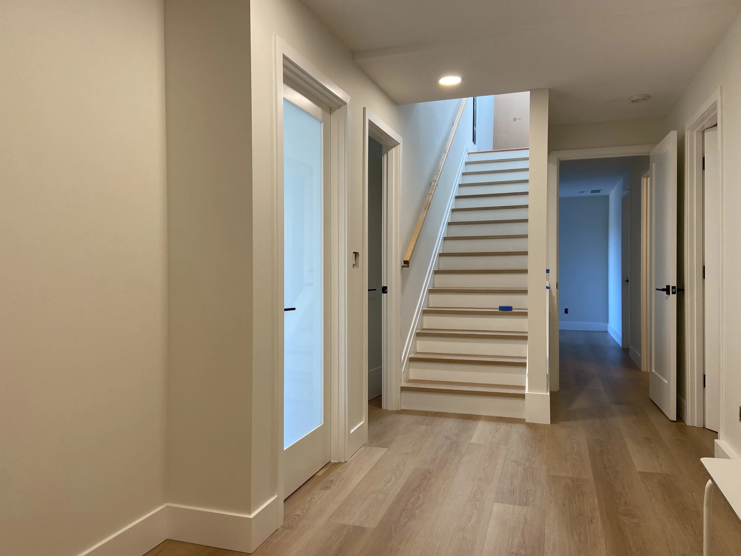 Basement drywall installation and Level 4 finishing in Mercer Island, WA with smooth walls and complete interior painting.