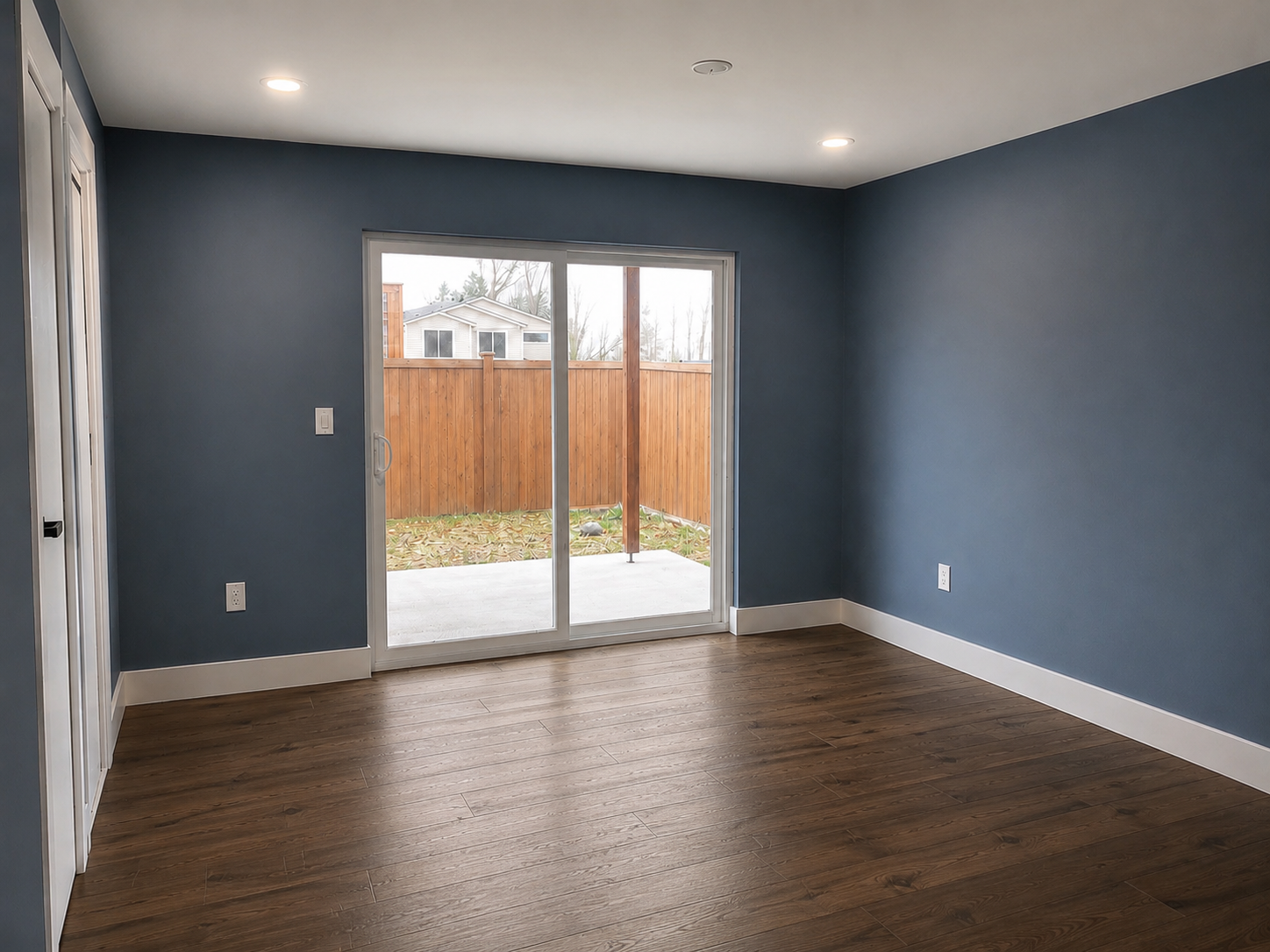 Completed Kirkland basement remodel featuring Level 4 smooth drywall finish, professional interior painting, and modern finished living space.