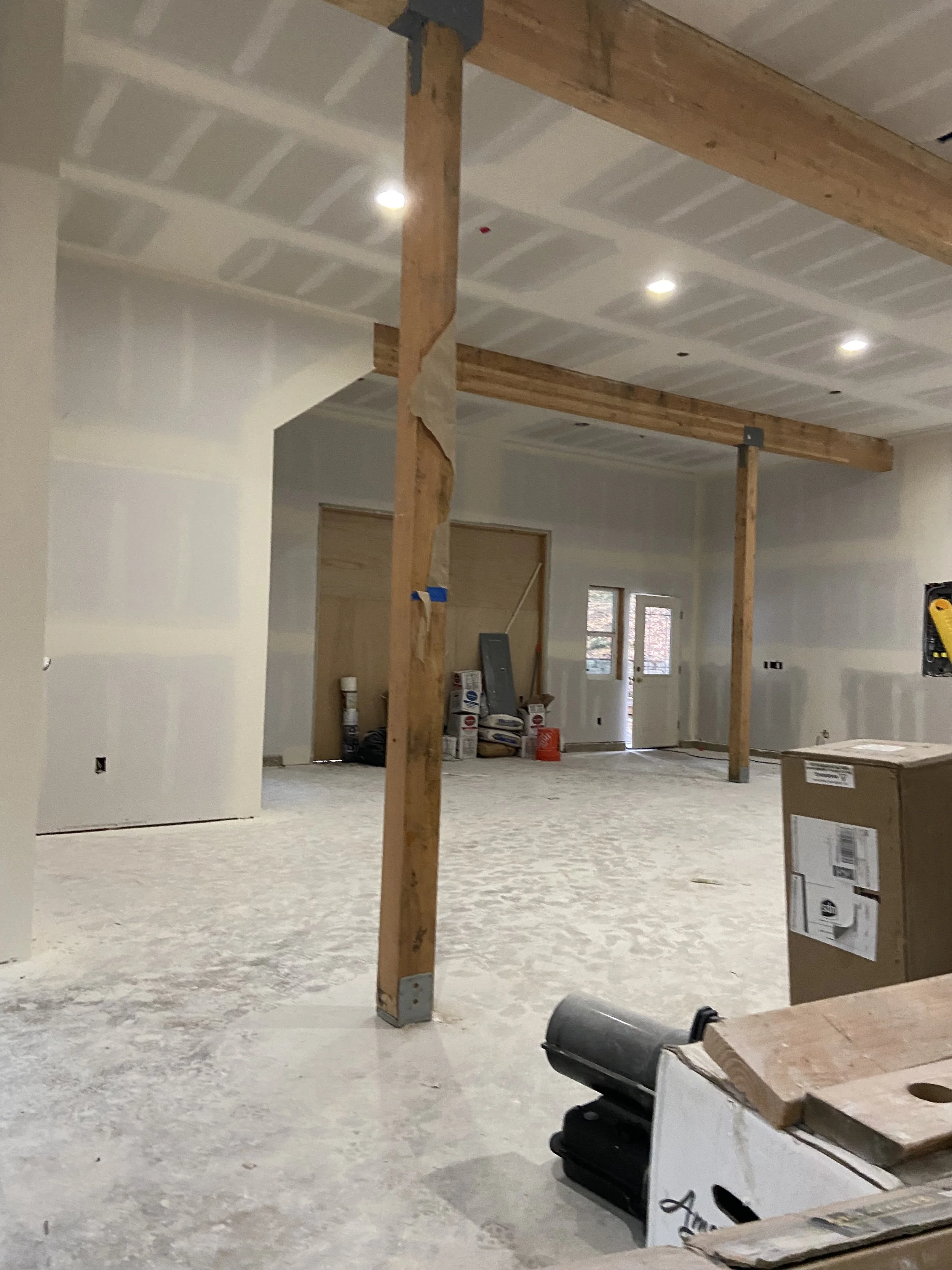 Garage drywall installation in Snohomish County WA showing open framing before drywall hanging and finishing