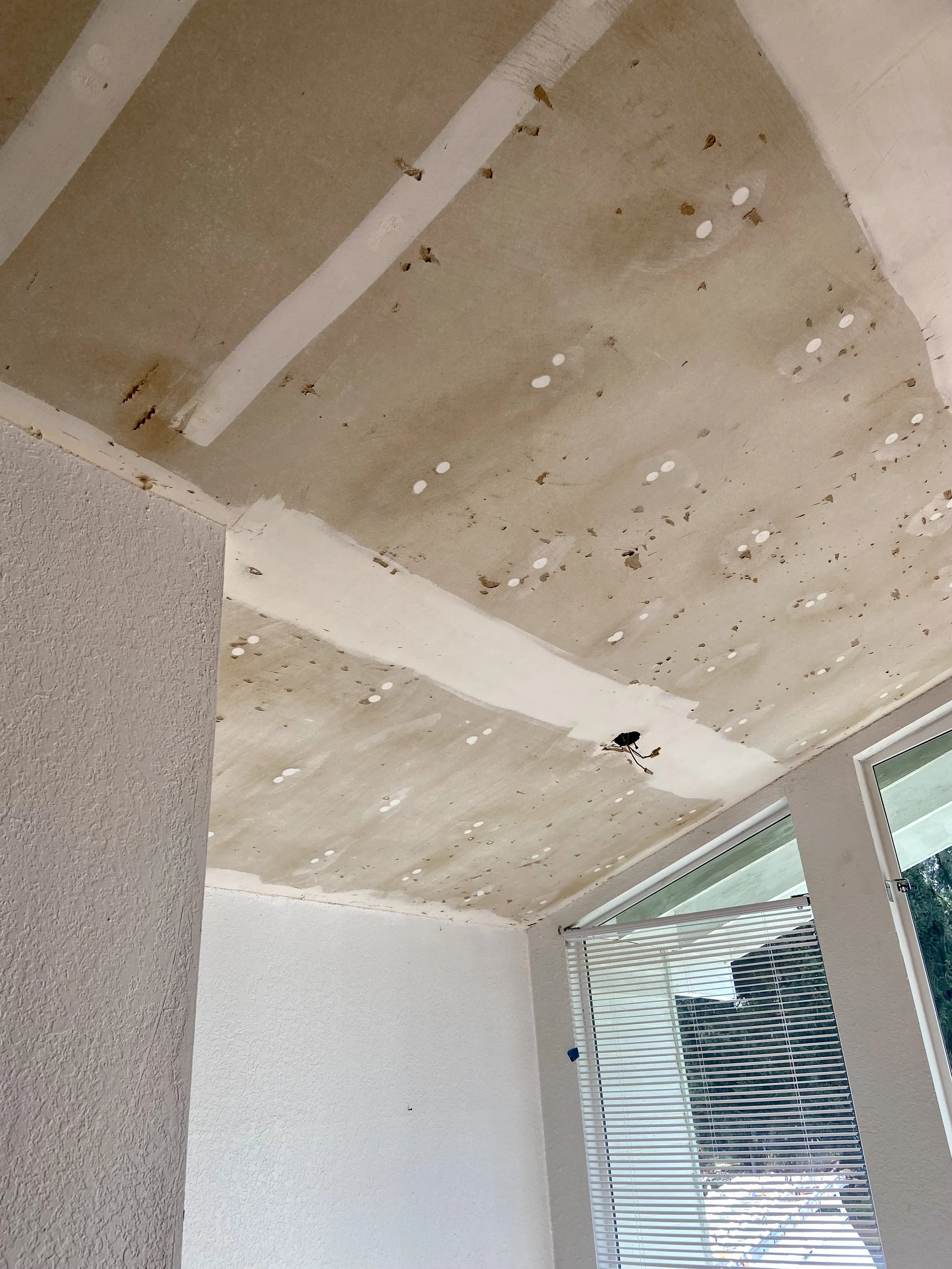 Ceiling surface repair and Level 5 skim coating after popcorn ceiling removal in Snohomish and King County homes — L.A. Drywall Inc.