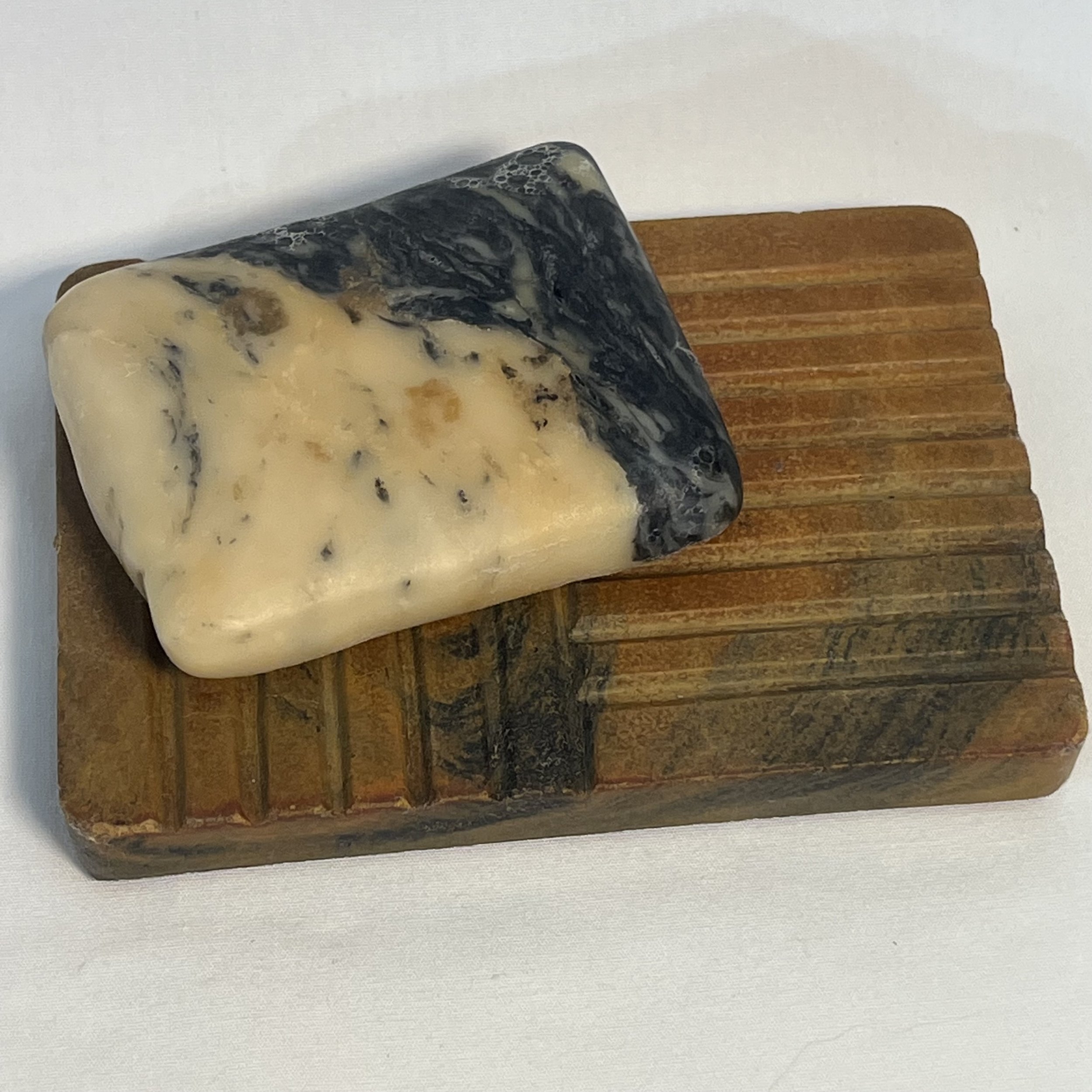 orange marbled concrete strata soap dish with soap.jpeg