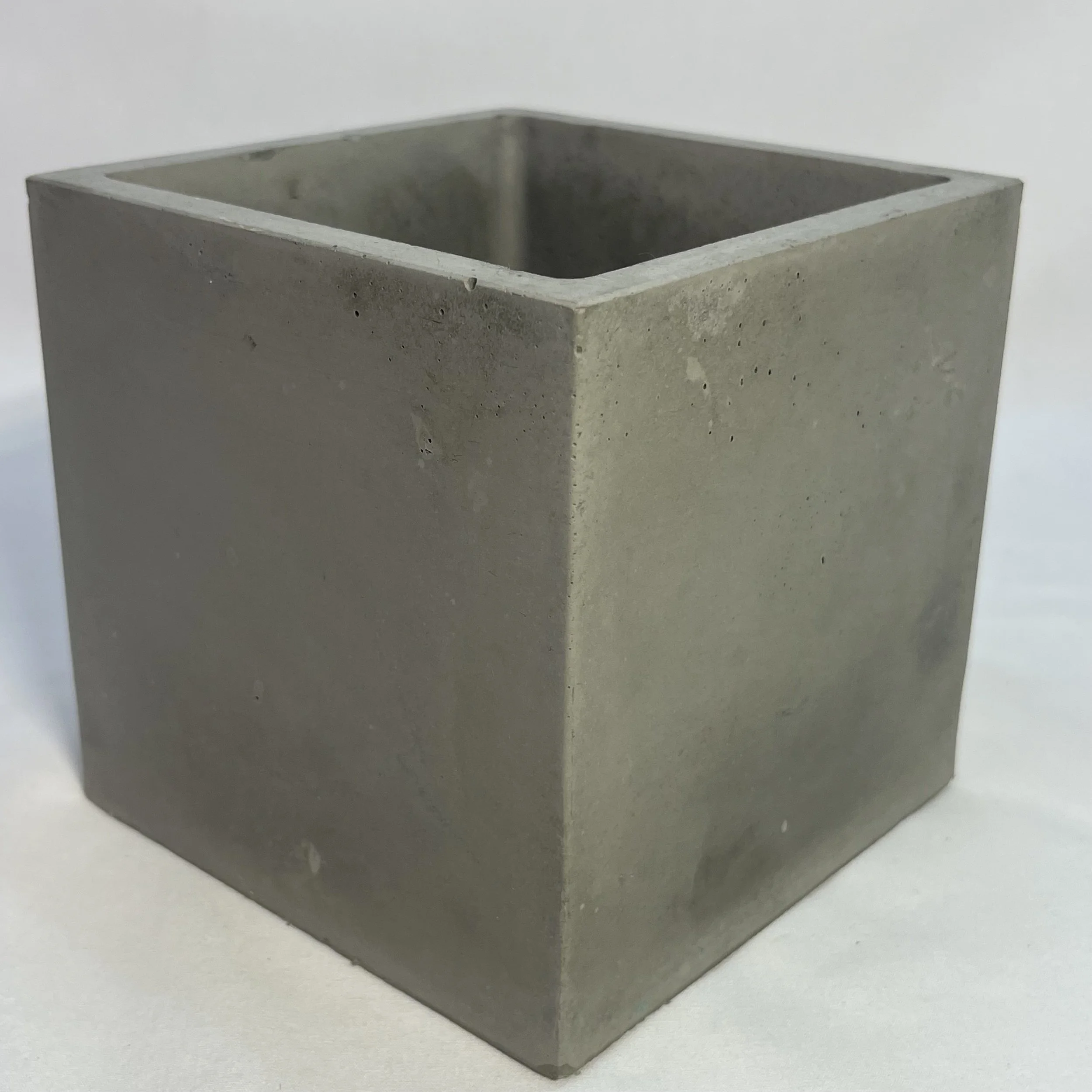 large gray concrete cube pot