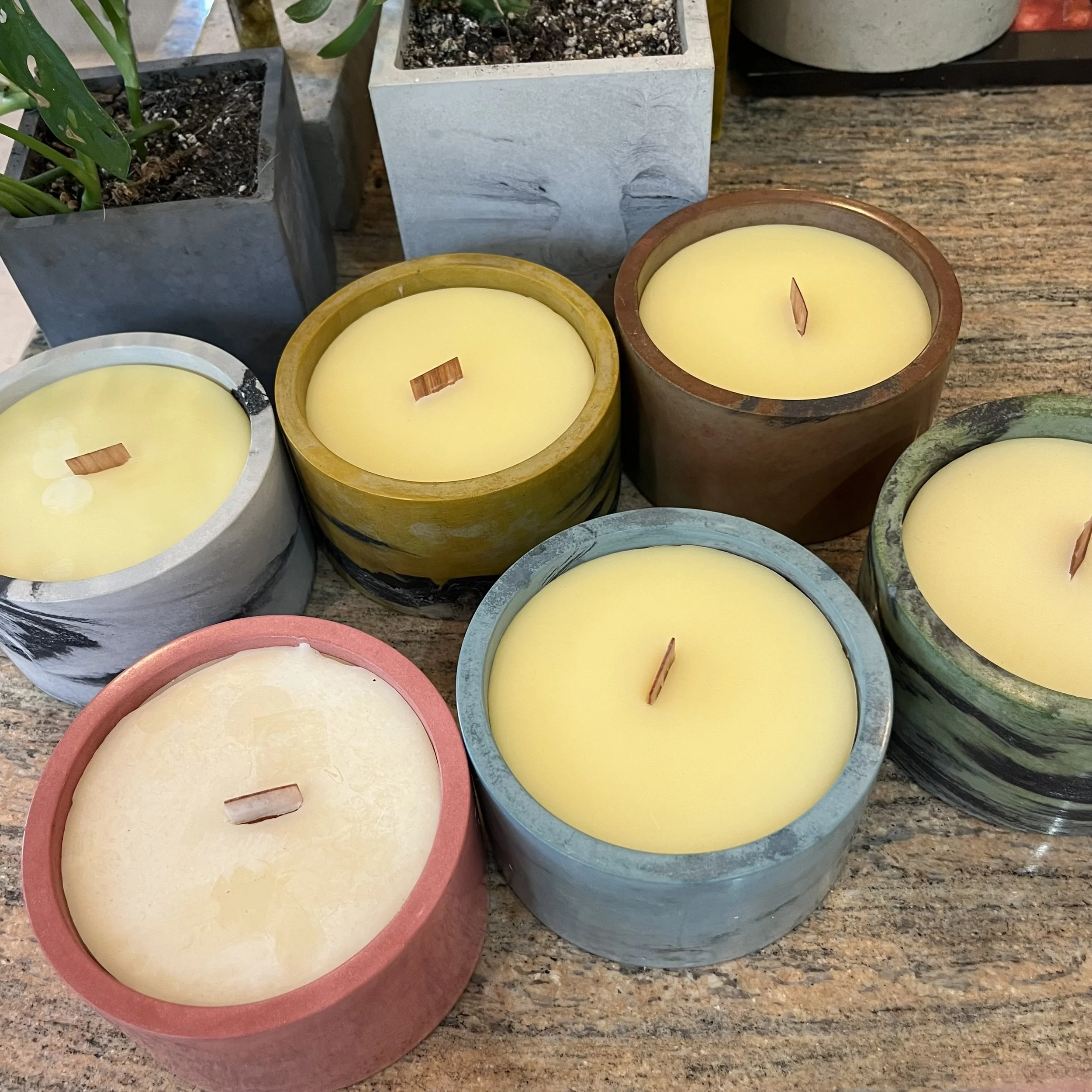group of marbled concrete short can beeswax candles.jpeg
