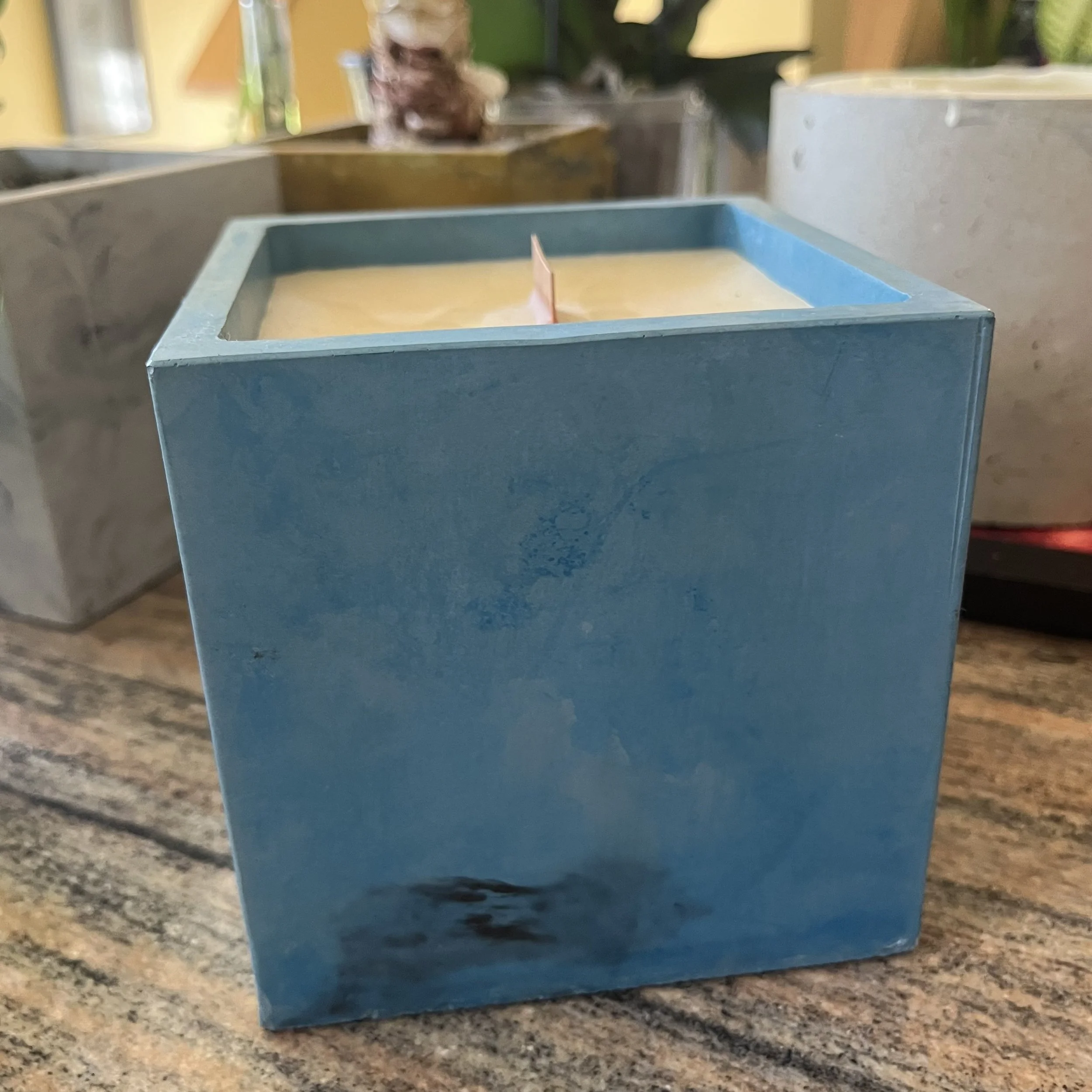 blue marbled concrete large cube beeswax candle.jpeg