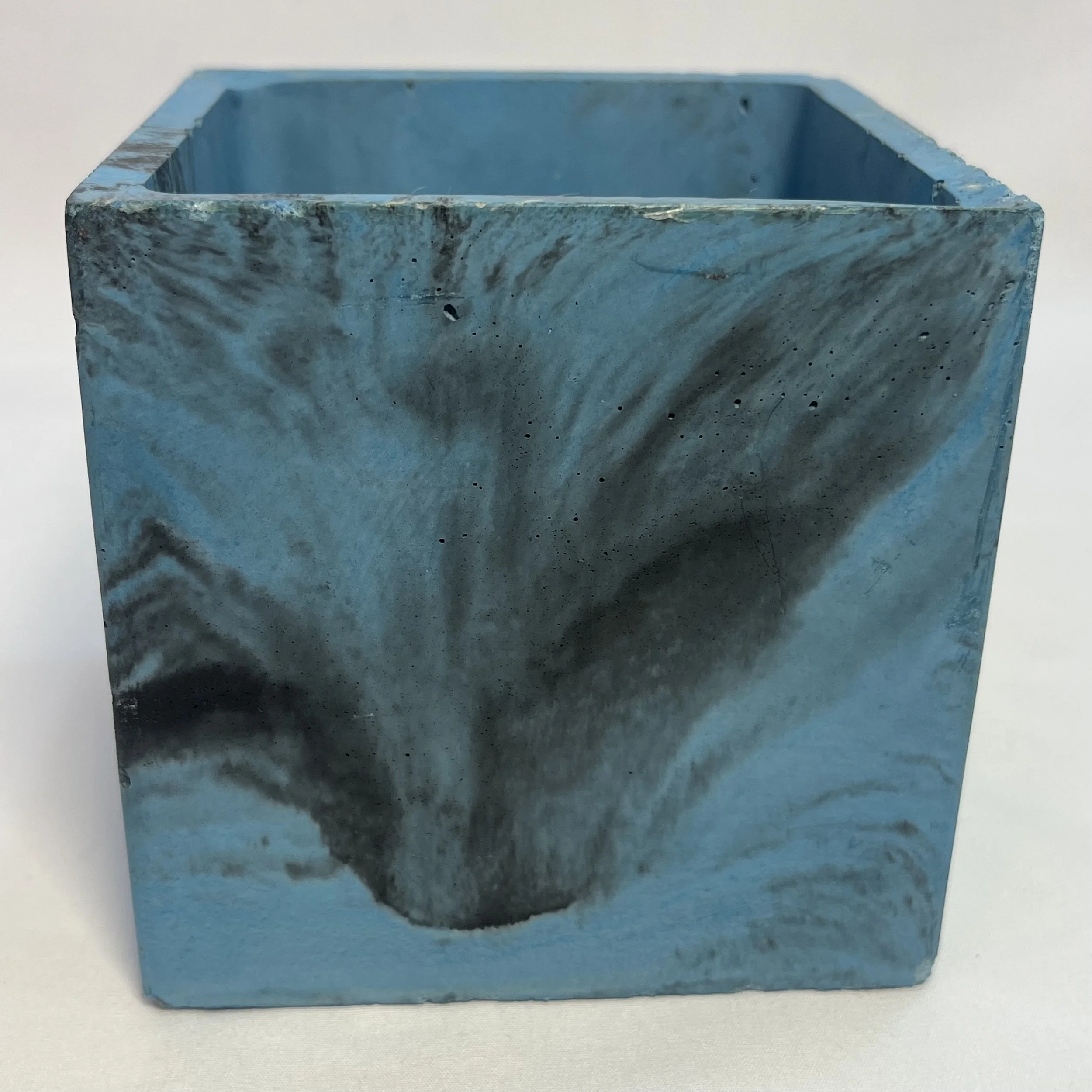 marbled blue concrete cube planter