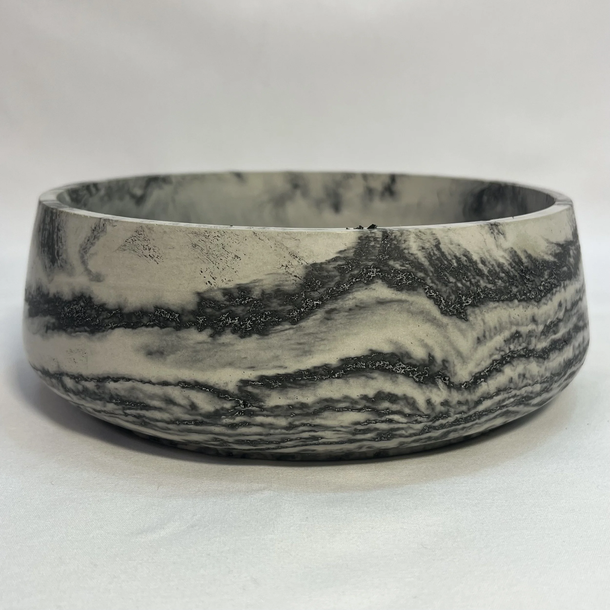 white marbled concrete dish