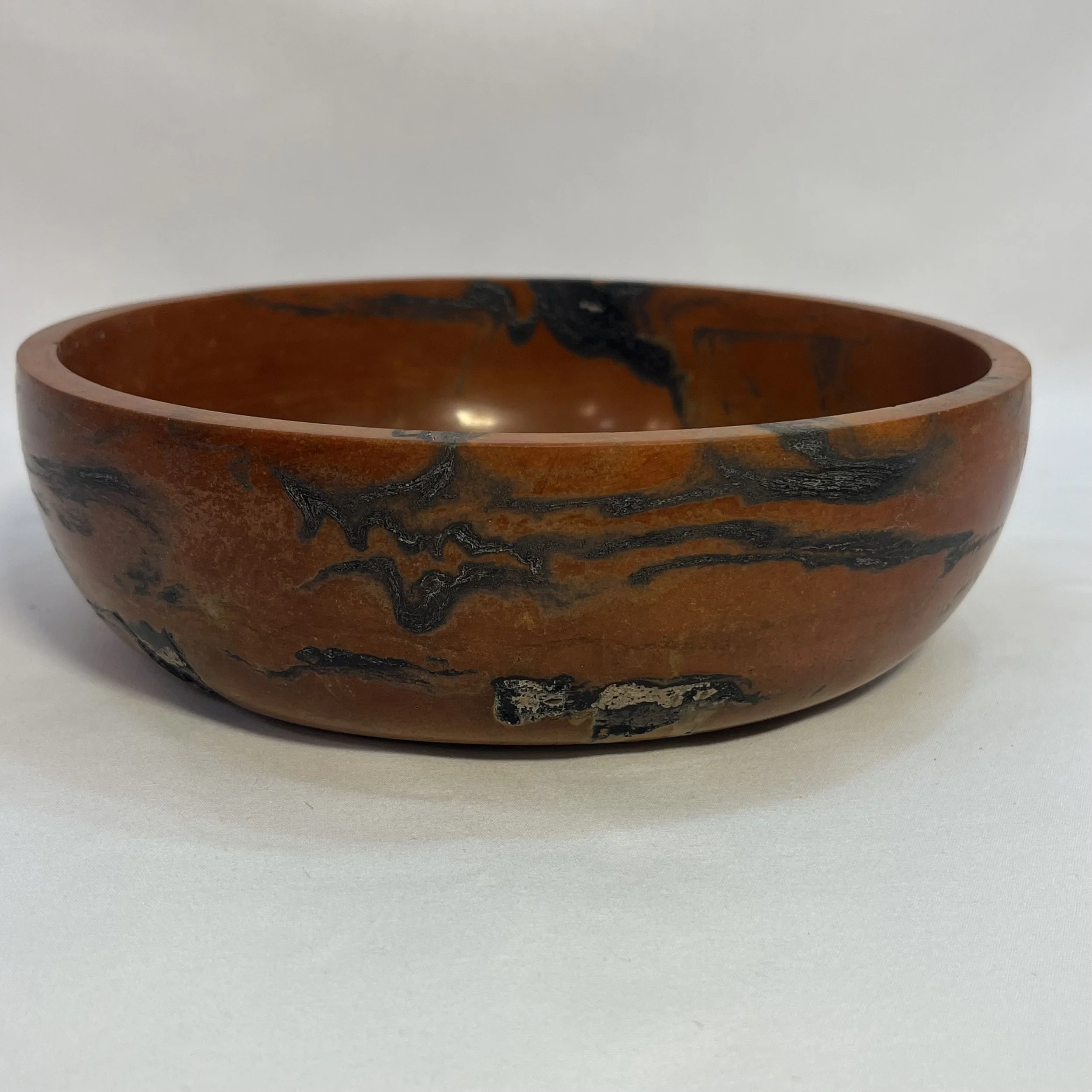 marbled orange concrete bowl