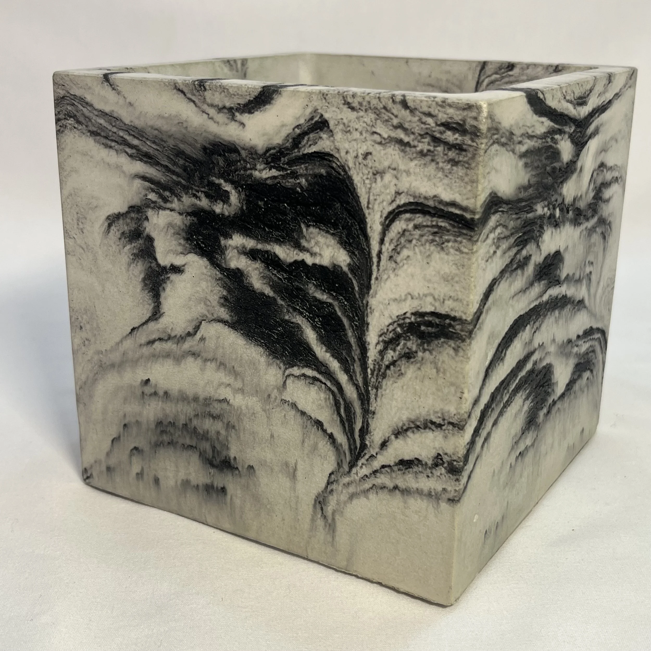 large marbled white concrete cube pot