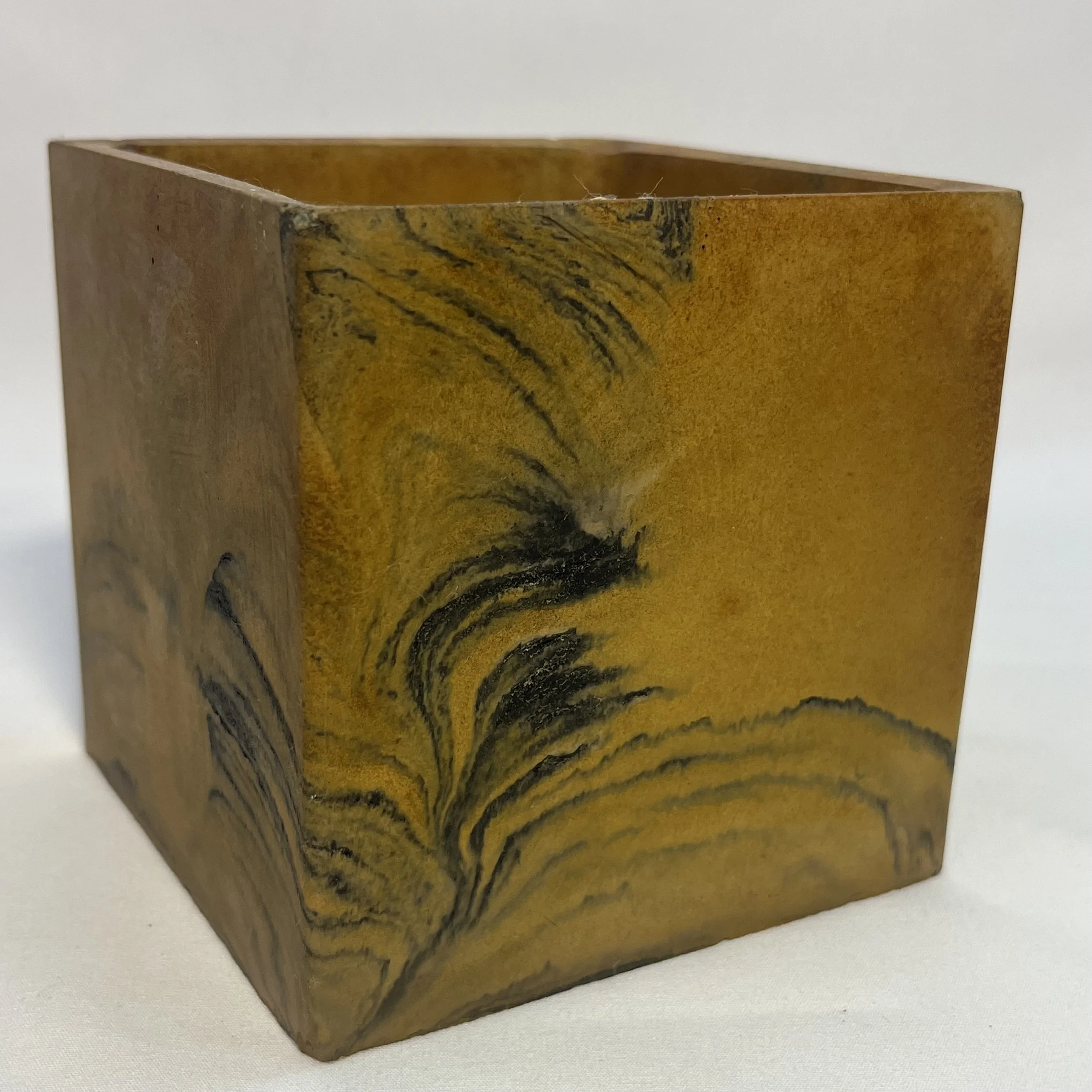 marbled yellow concrete cube planter