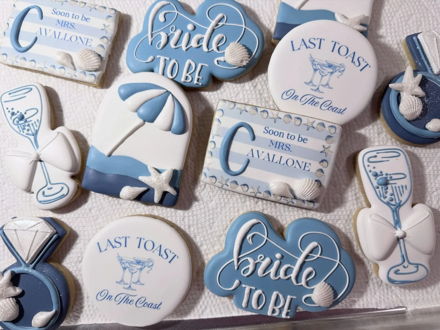 Still loving this set - Last Toast on the Coast with soft blues, seashells and coastal vibes for this bride! 
.
.
#lasttoastonthecoast #customcookies #brideera #bachloretteparty