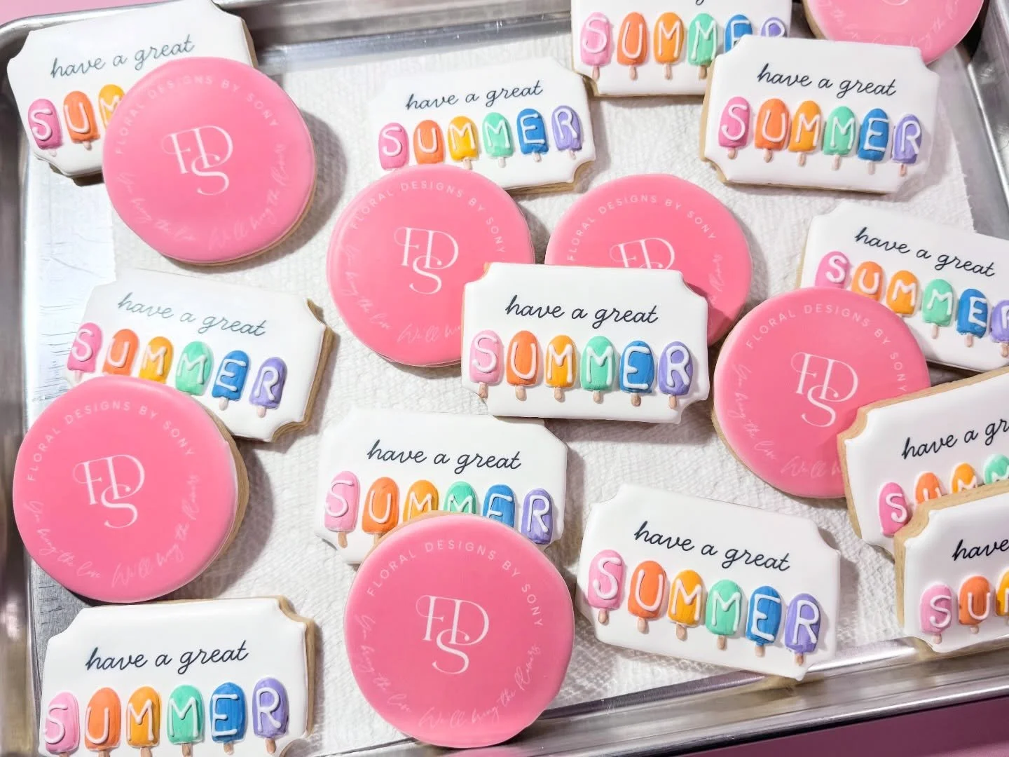 Last summer sweetness! 
Throwing it back to these beautifully simple custom cookies &mdash; clean designs, perfect logos, and the cutest little popsicles to match. Sometimes simple really is the most delicious kind of statement.
Already dreaming up t