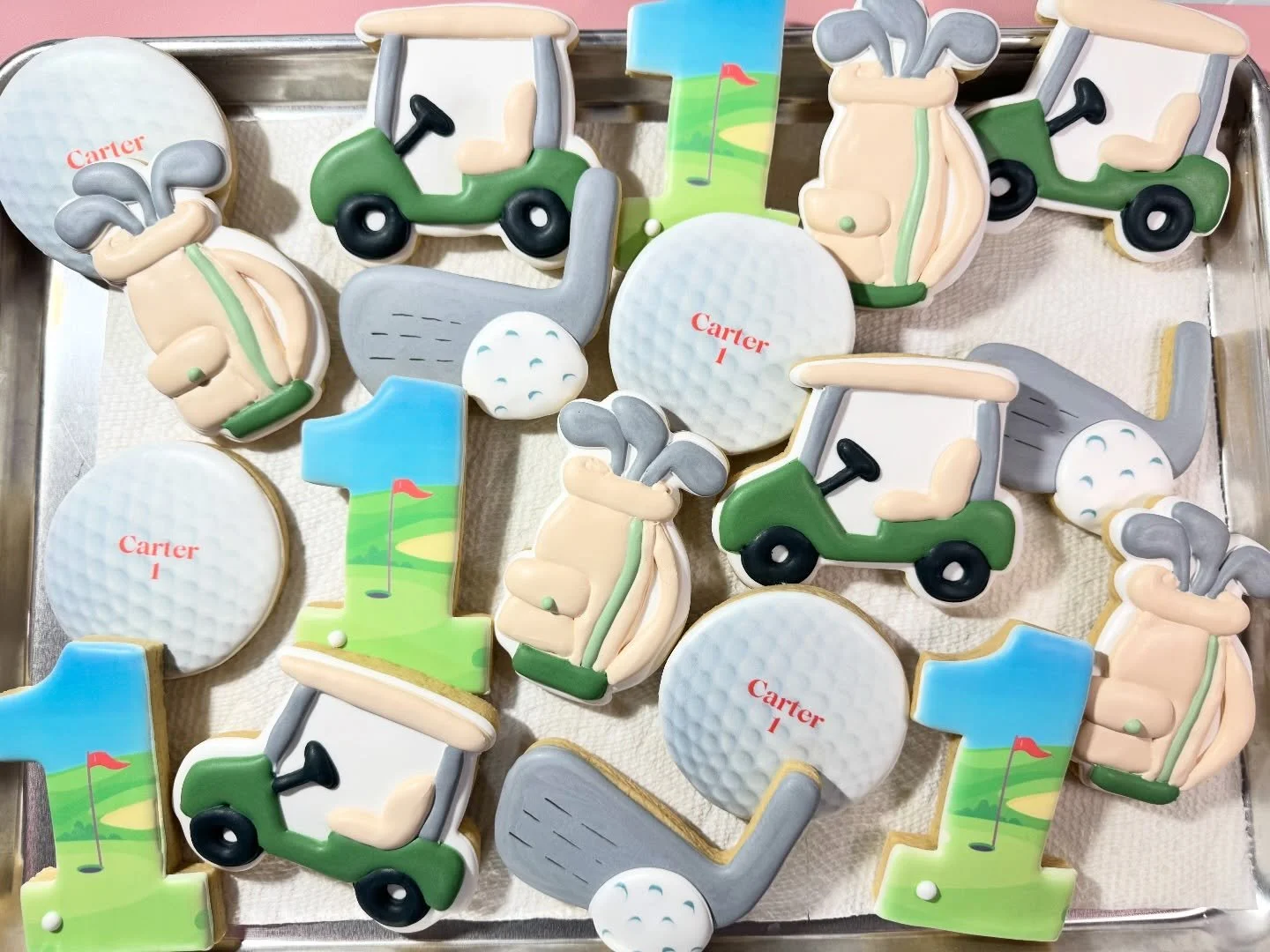 Teeing up for the sweetest first birthday celebration ⛳️🏌️&zwj;♂️ From golf carts to clubs on the green, these custom decorated cookies were the perfect par for the party! .
.
#FirstBirthday #GolfThemeBirthday #CustomCookies #DecoratedCookies #Birth