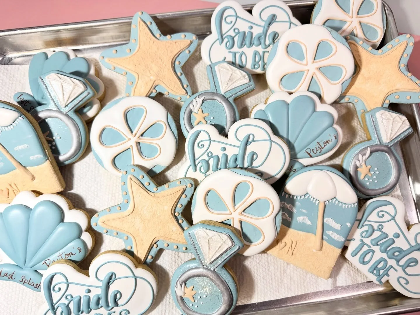 Last splash before the ring 💍🌊 Celebrating Payton with the sweetest beachy bachelorette cookies featuring seashells, beach umbrellas, and toes in the sand. The perfect treats for a sun-soaked girls&rsquo; getaway!
.
.
#LastSplash #BacheloretteParty