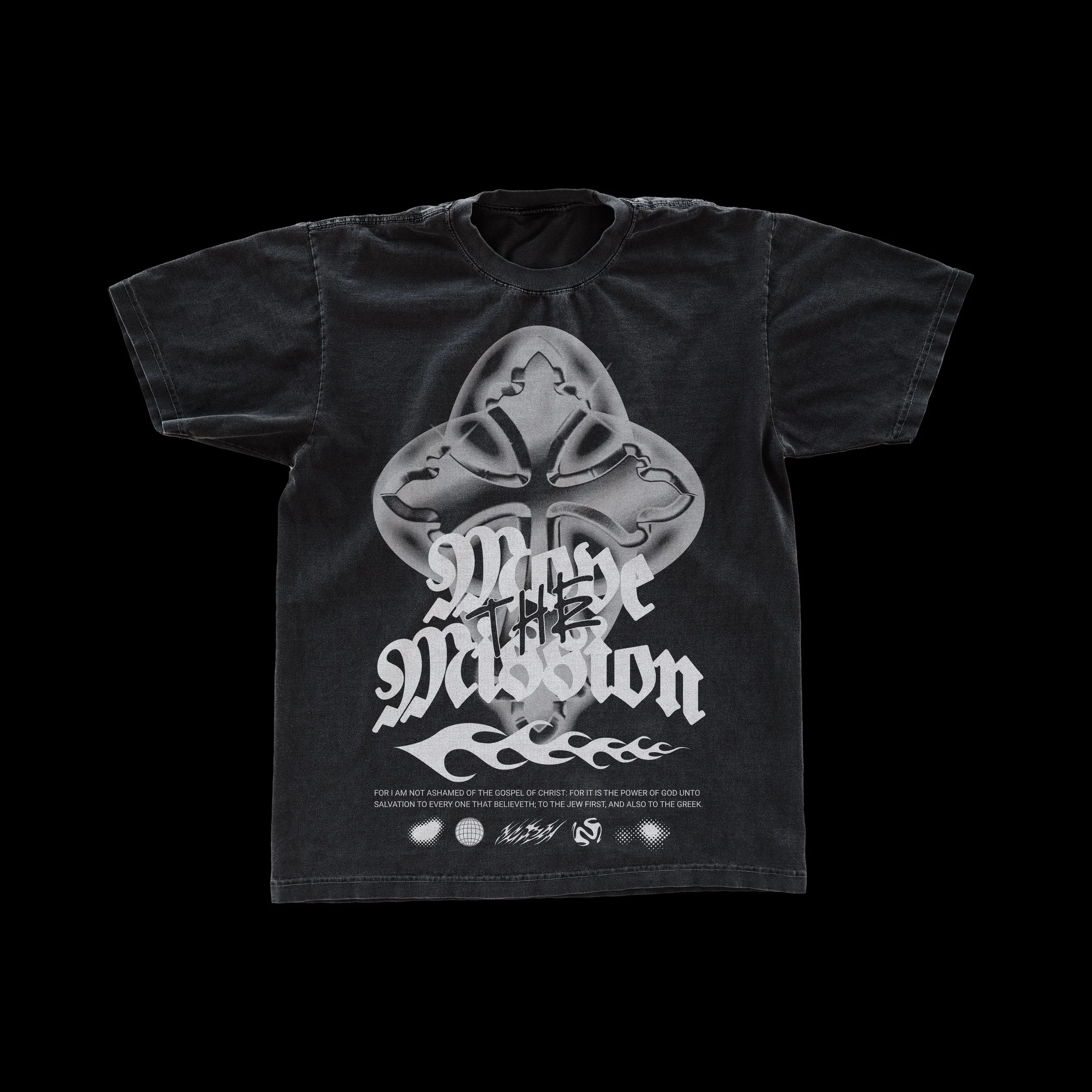 Black T-shirt with a graphic design featuring metallic tribal symbols, stylized text, flames, and religious text at the bottom.