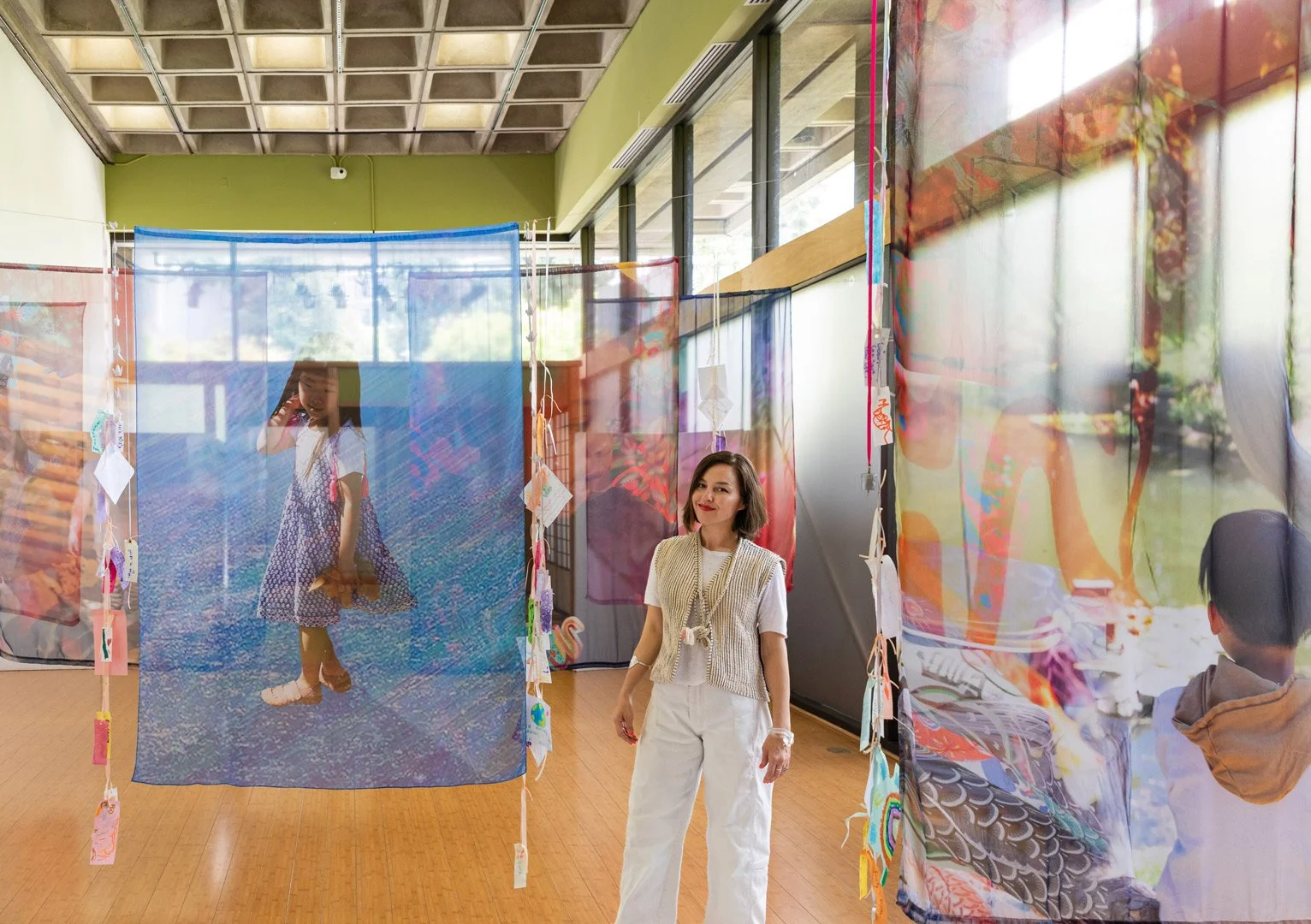 Artist Faith-Ann Kiwa Young in front of Installation