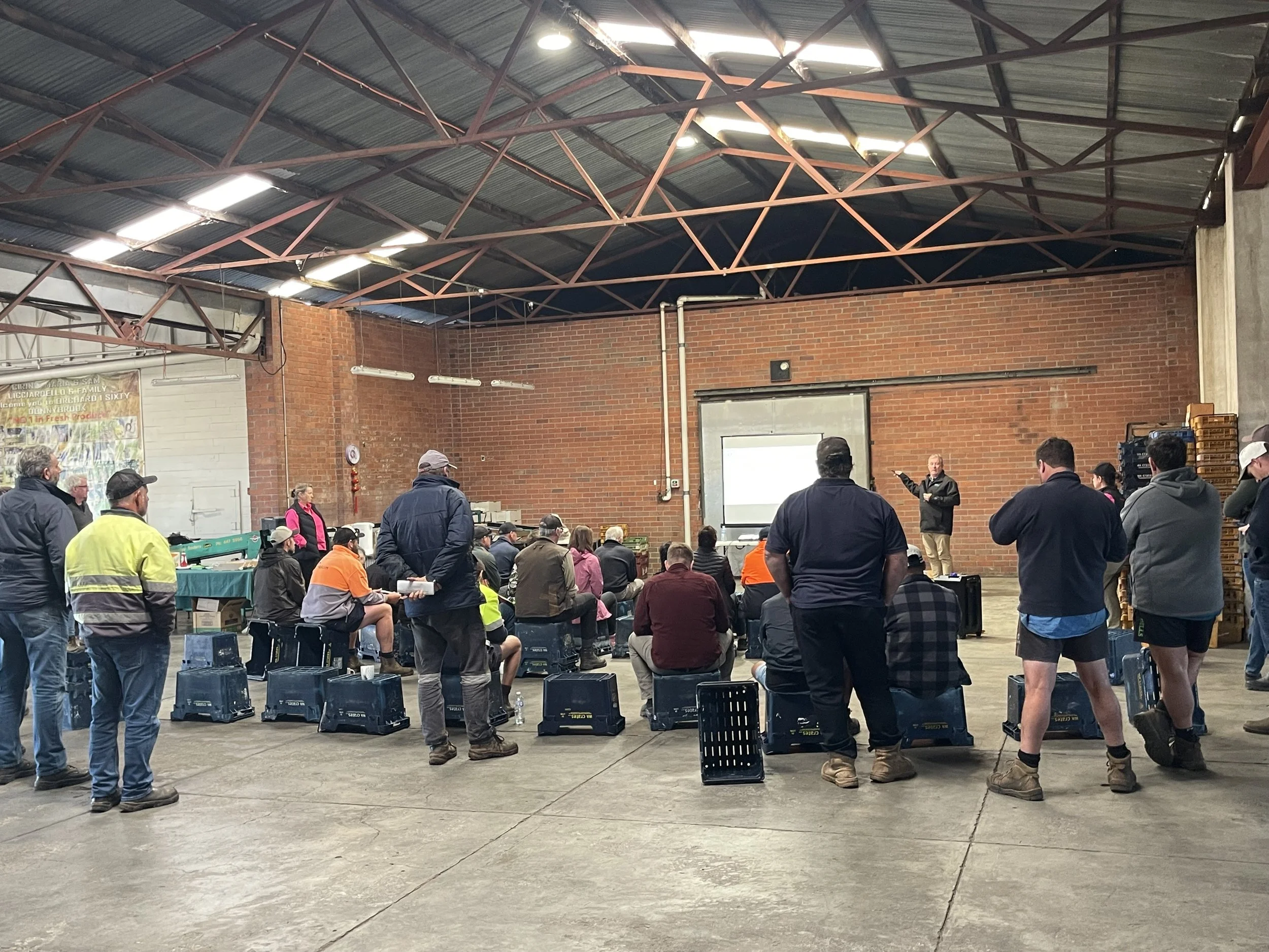 Rear view of attendees in the shed.jpeg