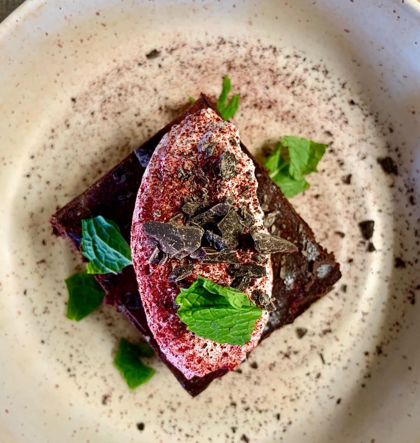 Spelt flour beet chocolate cake with whipped cream fraiche, dark chocolate ganache, &amp; beet powder. It&rsquo;s so rich! Goes great with a cocktail or an espresso. No we will not make you an espresso martini.