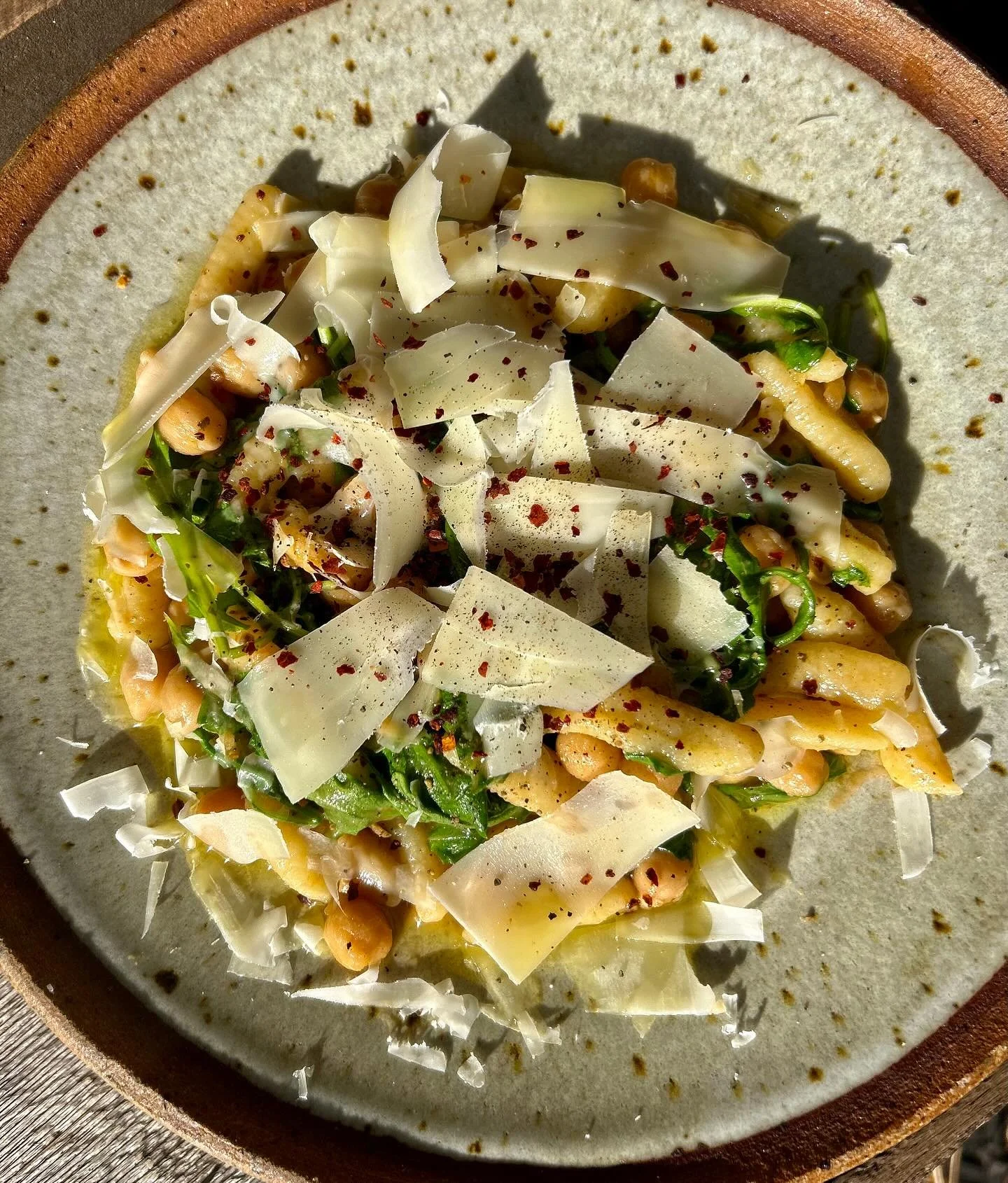 Pasta con ceci. Sourdough cavatelli pasta, chickpeas, arugula, parm, & Aleppo. Comfort food.