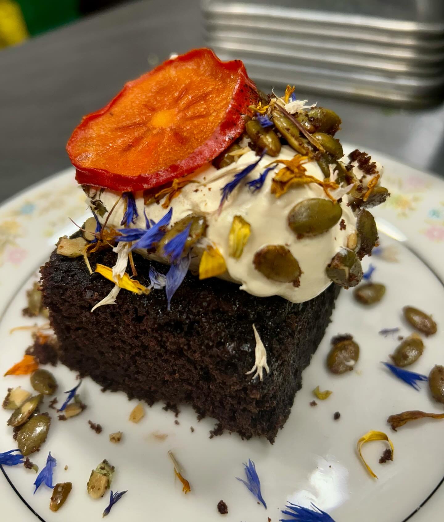 Ancho &amp; canela chocolate cake w/ dolce de leche whip, candied pepitas, and persimmons. Danger Will Robinson!