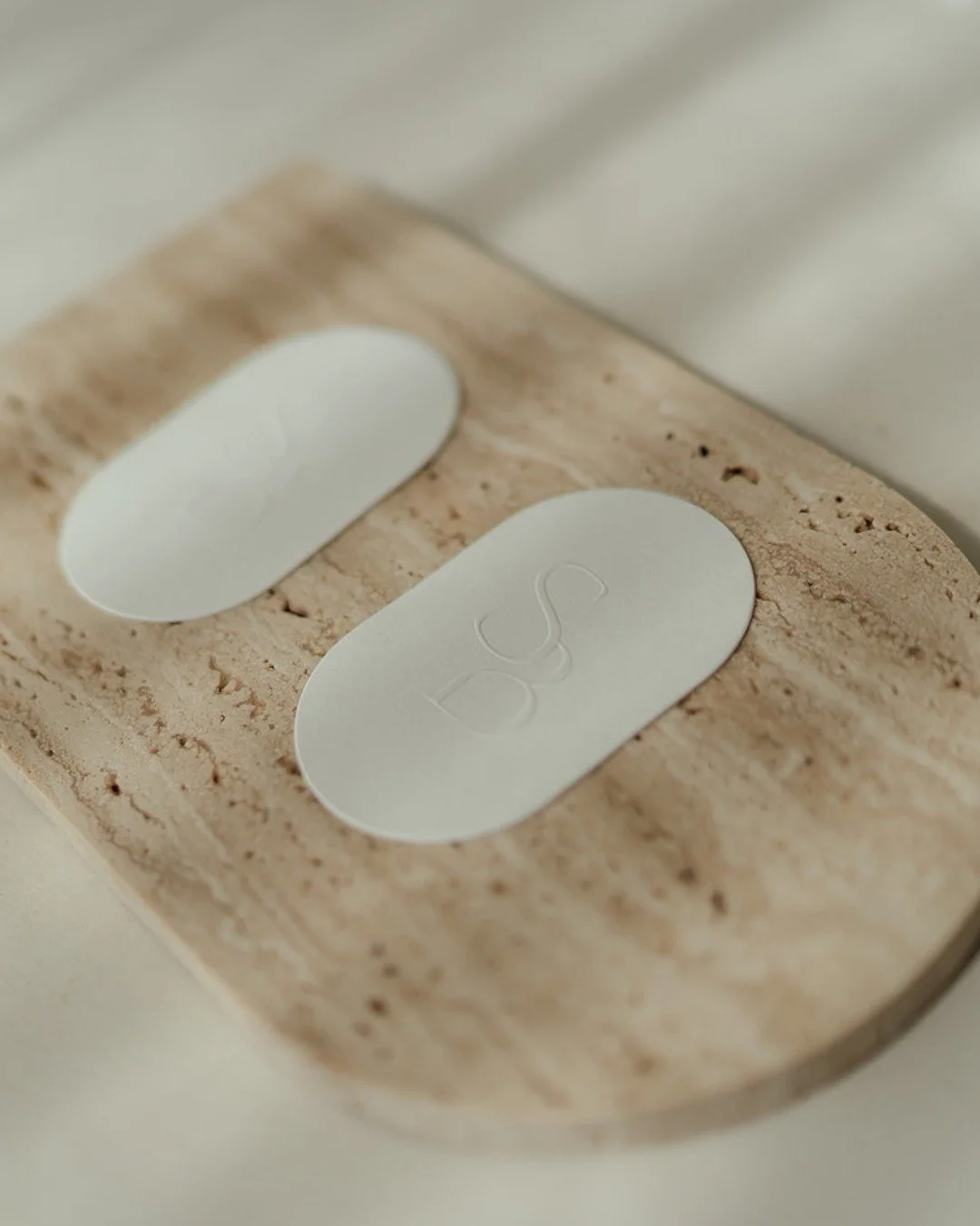 Pill shaped salon appointment cards with an embossed logo, designed for a refined, minimalist, and elevated feel.

#AllyMayDesignStudio #AllyMayDesign #DunsboroughDesign #DunsboroughBranding
#DunsboroughCreatives #SouthWestDesign #DunsboroughBusiness