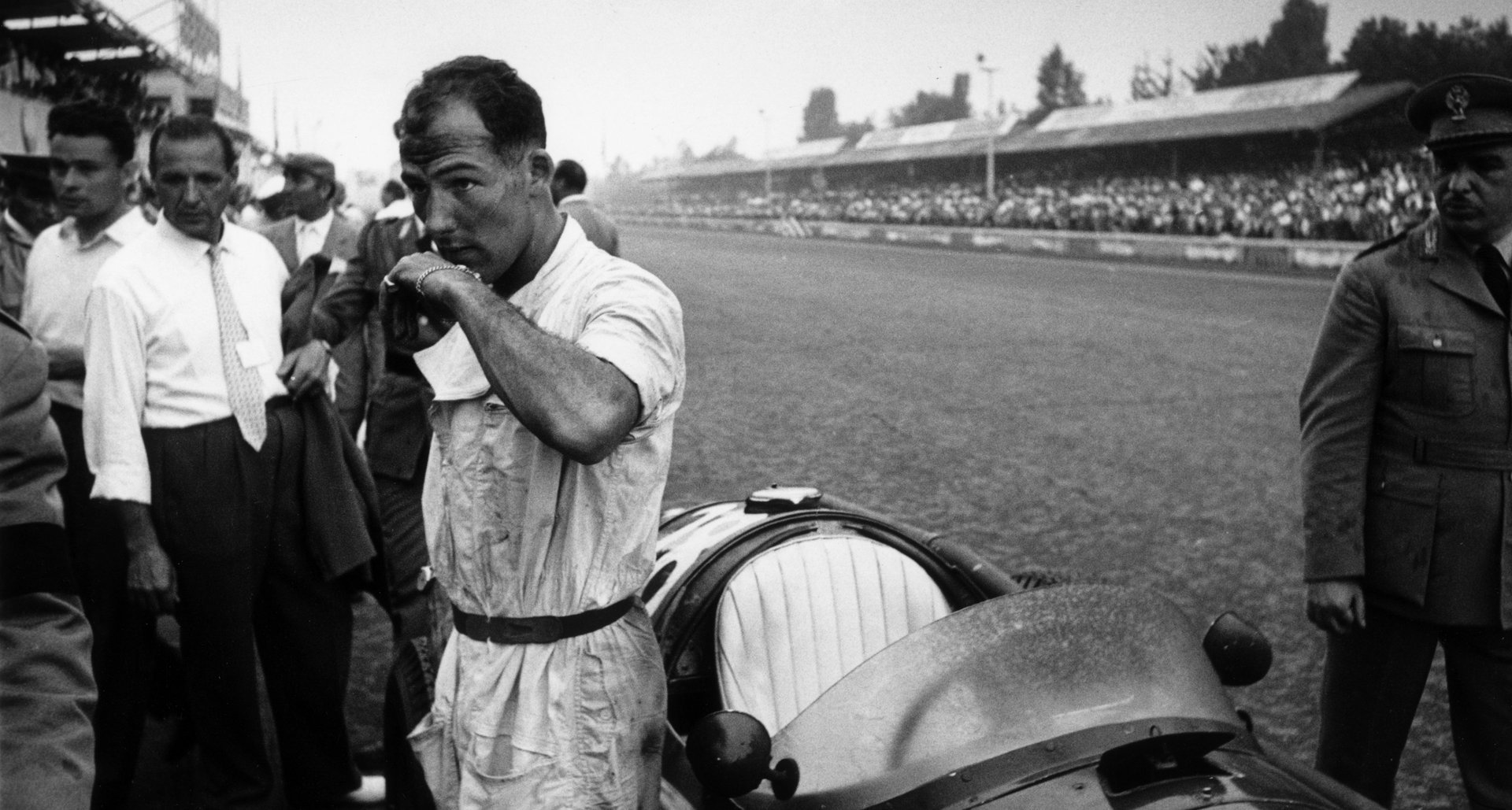 Stirling Moss with Maserati at Monza 1954.jpeg