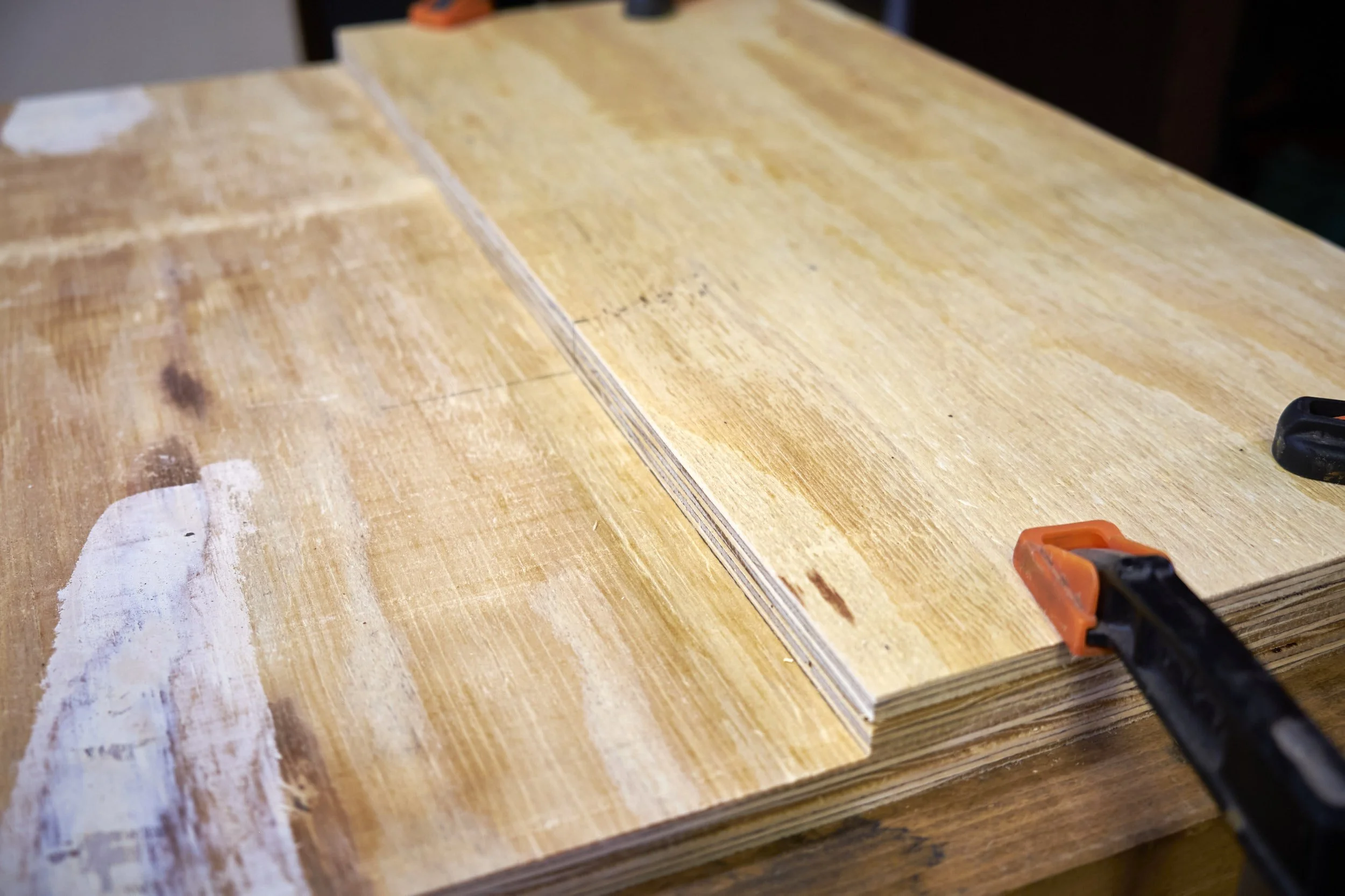 Shelf positioned on the side panel ready for the mortises to be cut.