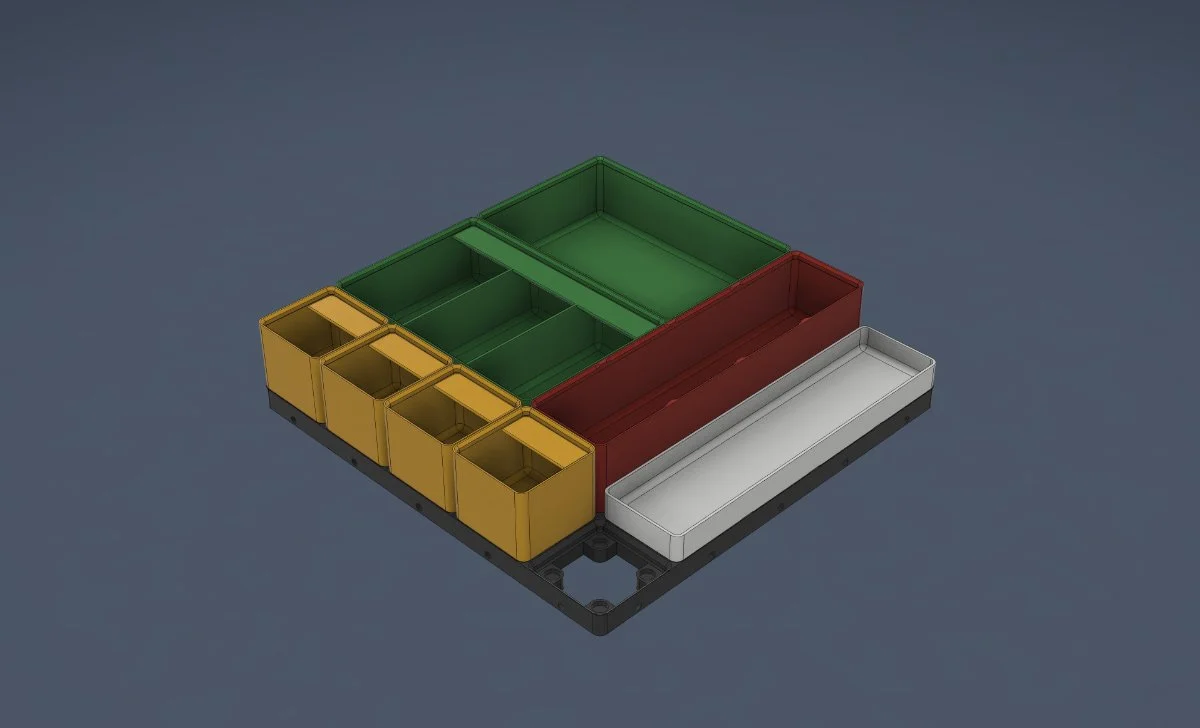 3D render of a Gridfinity tray and bins, colours indicating bin types on a grey background.