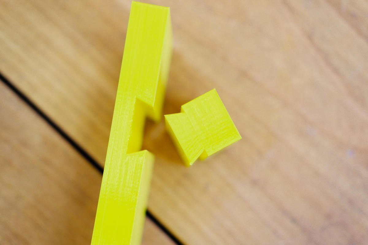 PETG 3D printed, yellow dovetailed sliding fence prototype.