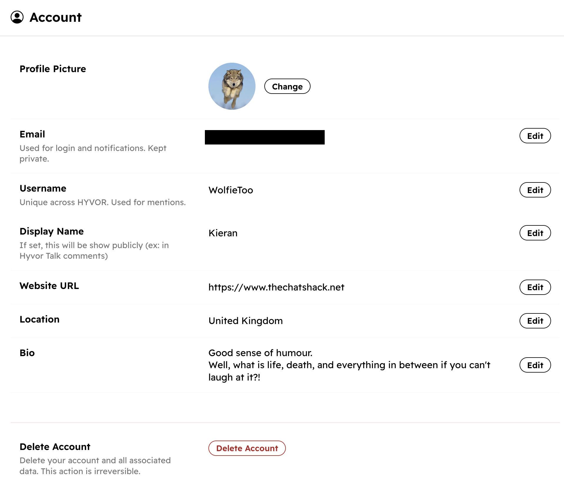 User account page showing profile picture of a wolf, with various editable account details including email, username, display name, website URL, location, and bio, along with a red delete account button.