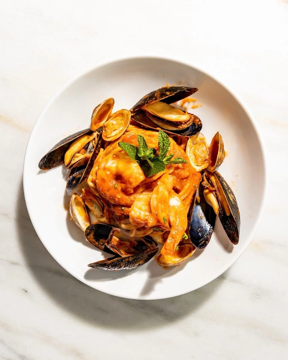 SPAGHETTI FRUTTI DI MARE, clams, mussels, shrimp, and tomato passata. A dish that never disappoints.