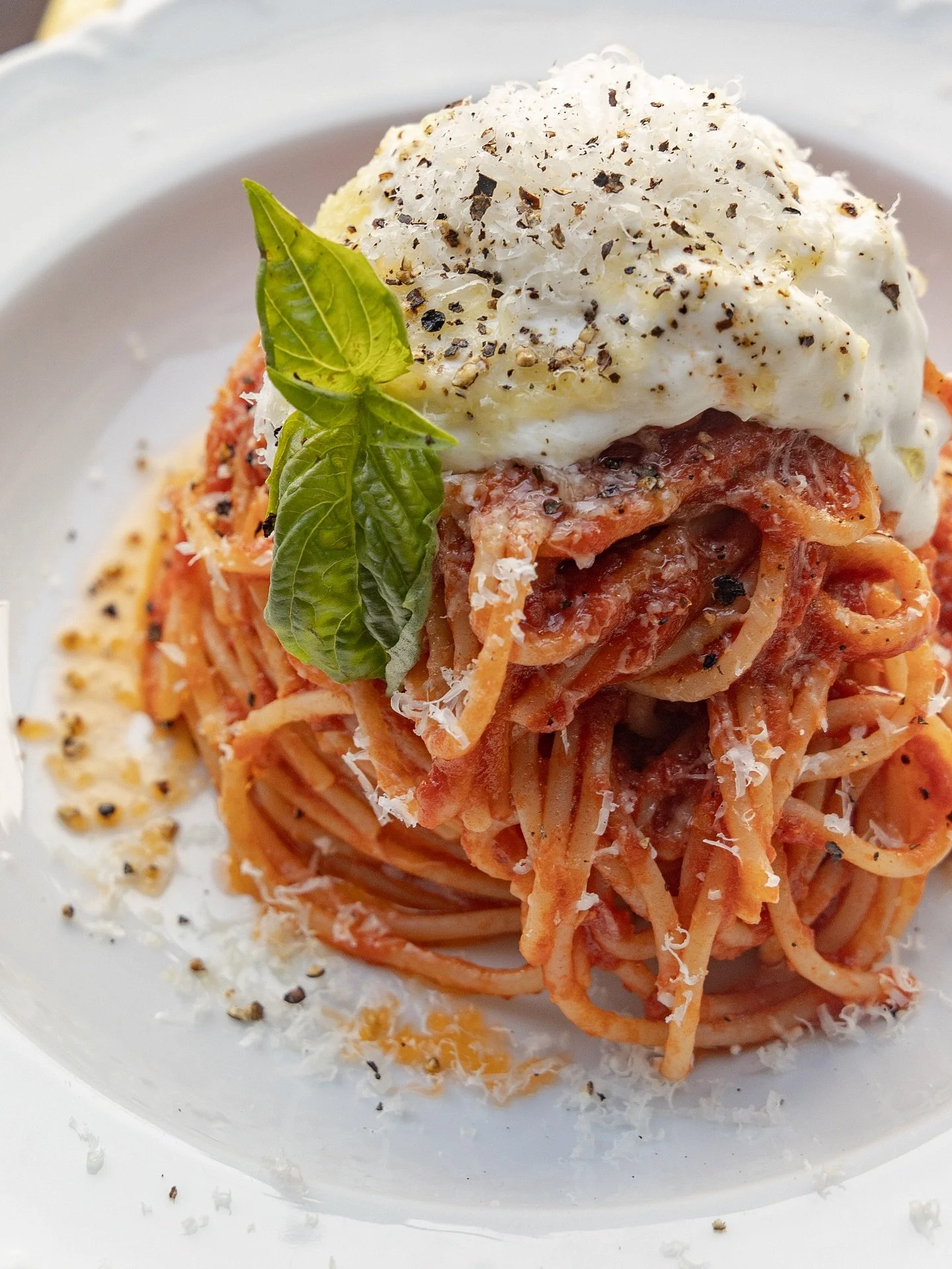 The sweetest things in life are always simple, like our SPAGHETTI POMODORO, tomato sauce, parmigiano, and stracciatella 🍝