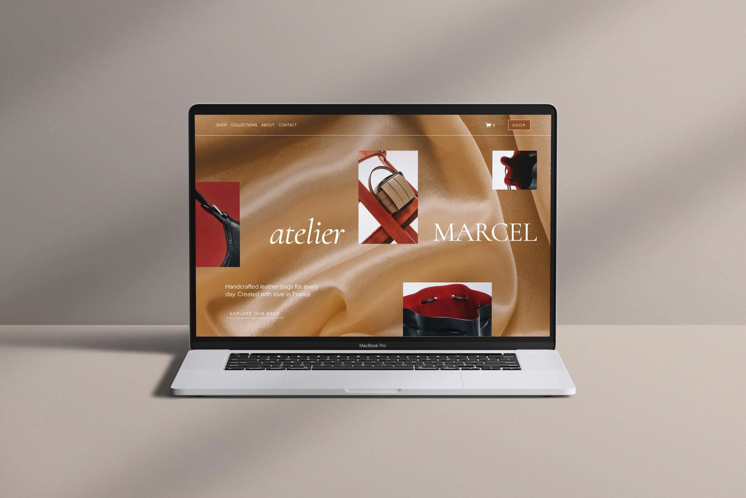 Laptop displaying ecommerce homepage design tips example for Atelier Marcel handmade leather bags with tan silk background