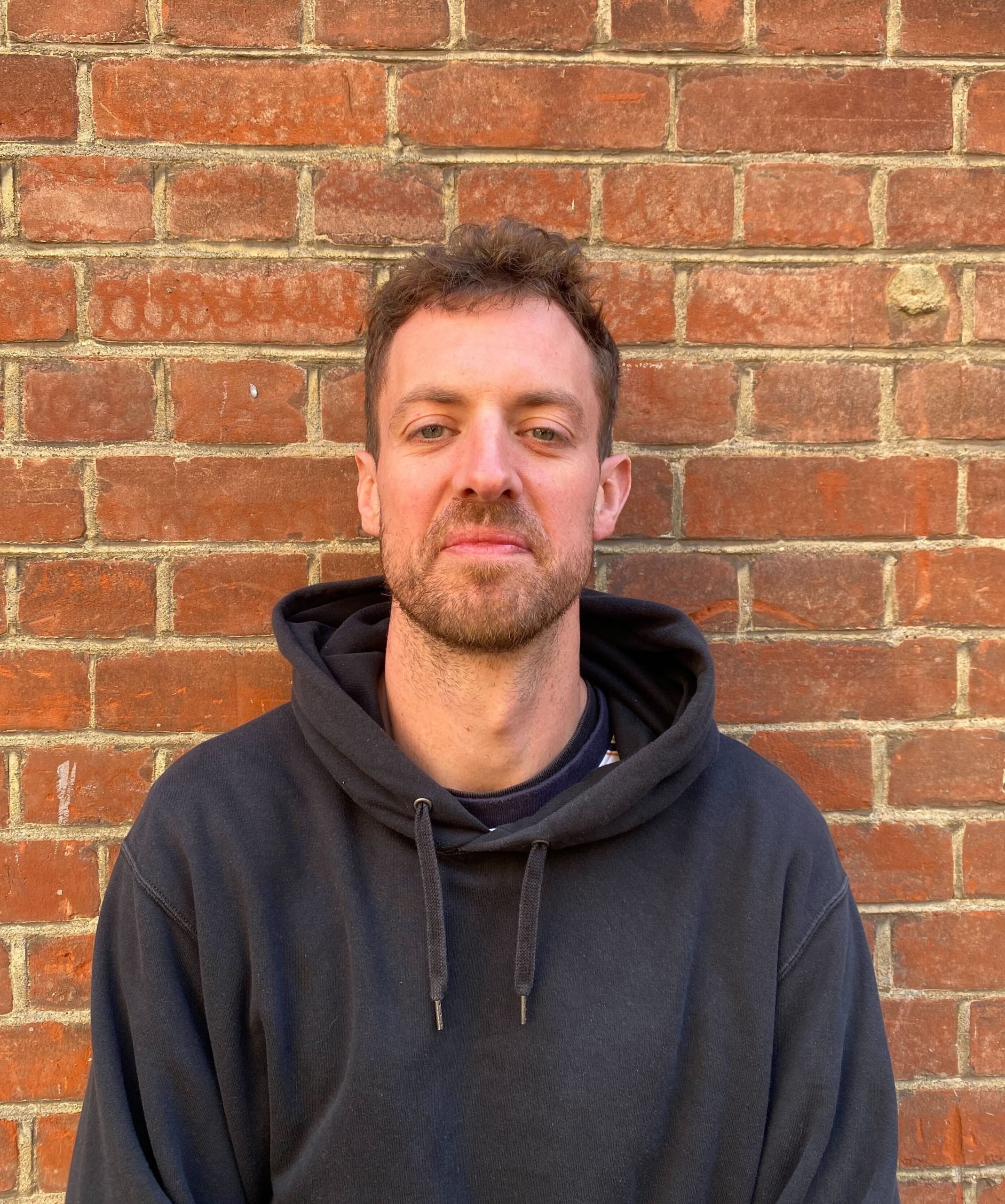 Arthur smiling at the camera