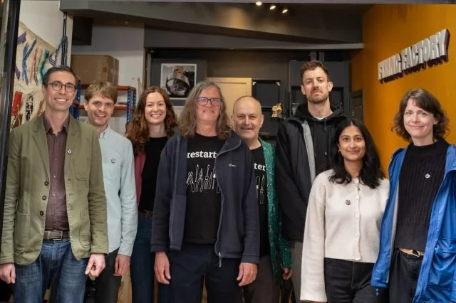 Hackney Fixing Factory team smiling at camera