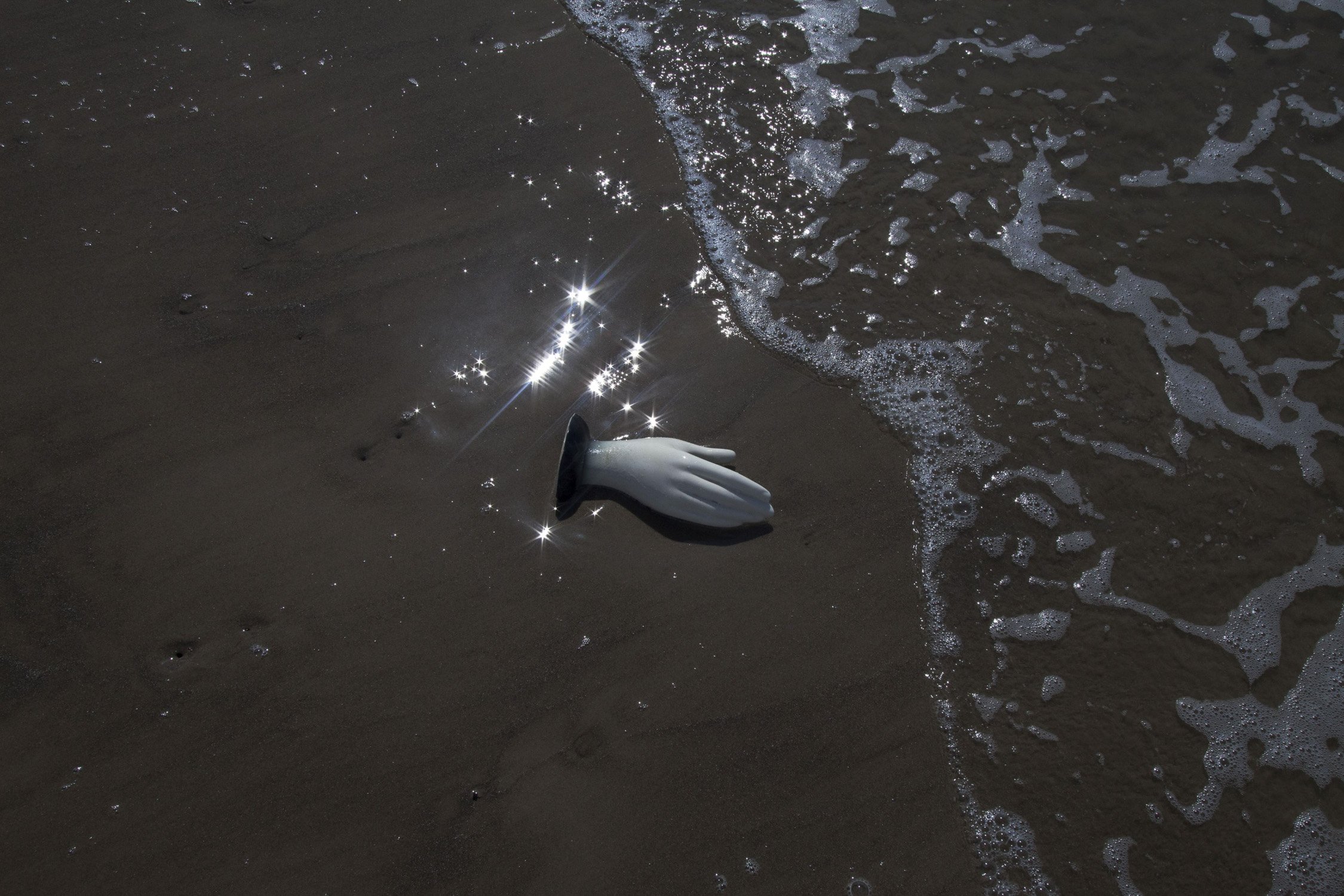  Debra Barrera,  Blanquita Hands on Sand, Los Irrompibles , digital photography, 2024 